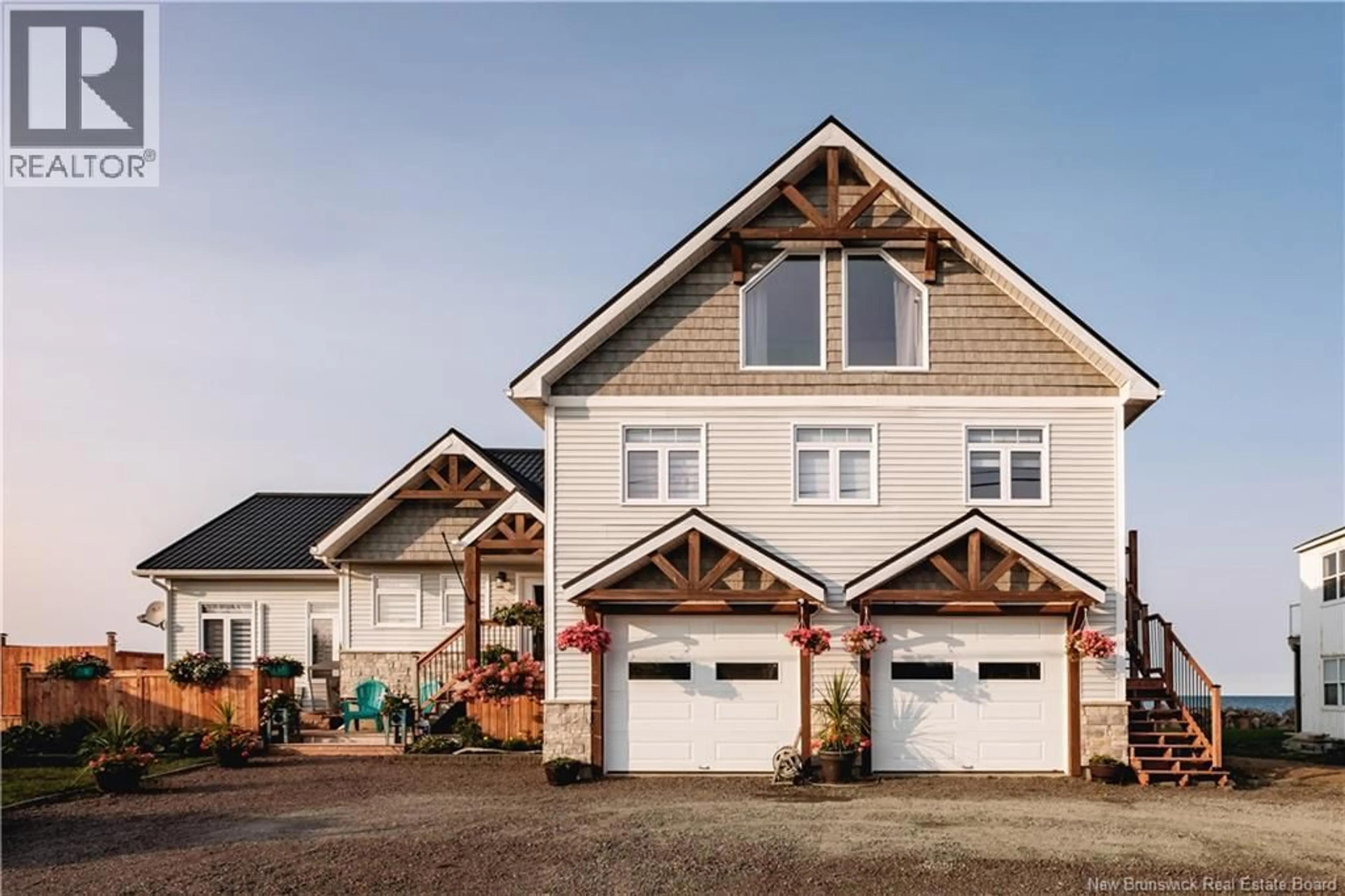 Home with vinyl exterior material, street for 39 OCEAN BREEZE DRIVE, Grand-Barachois New Brunswick E4P7X3
