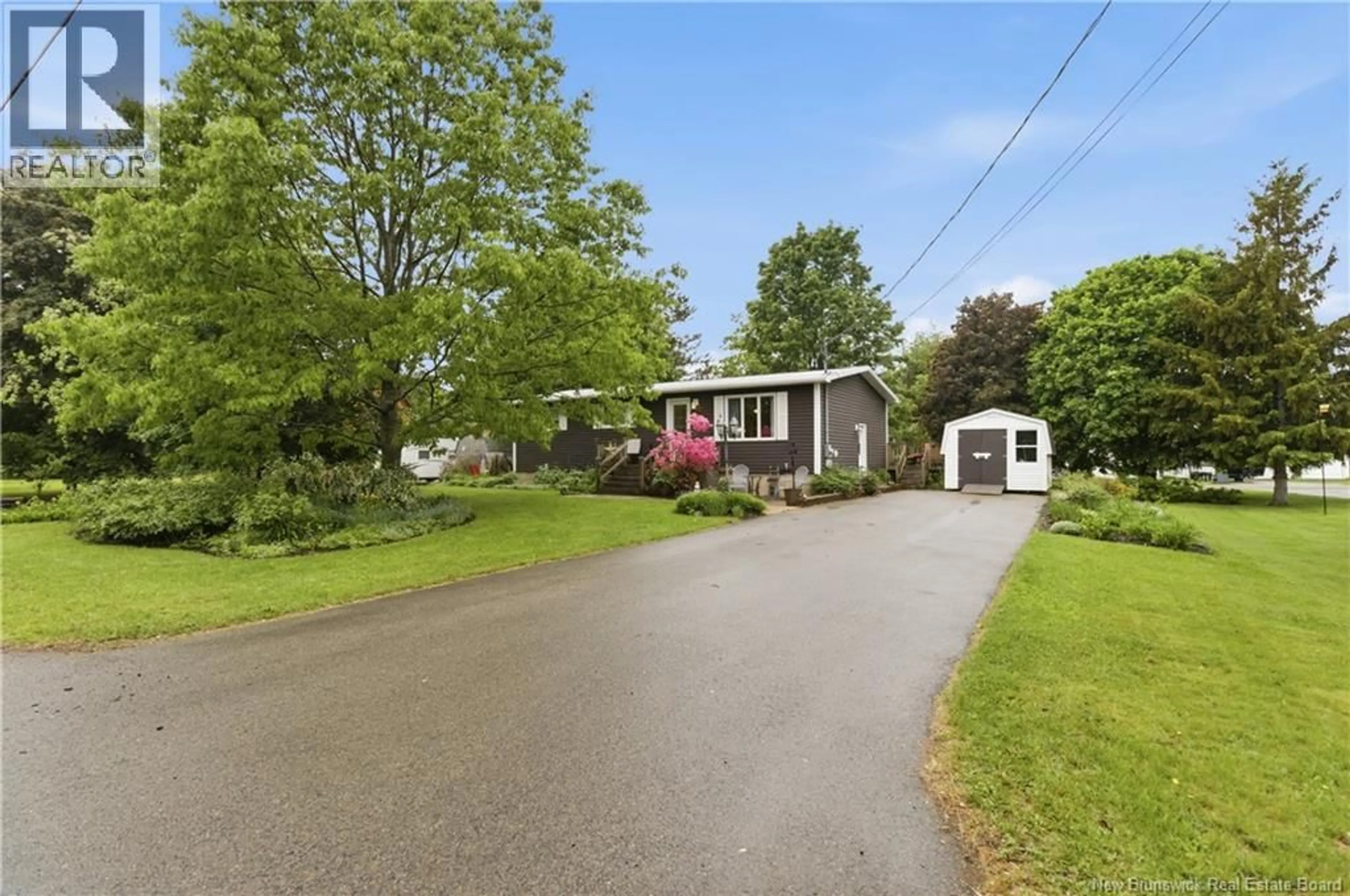 A pic from outside/outdoor area/front of a property/back of a property/a pic from drone, street for 16 WEBSTER AVENUE, Sussex Corner New Brunswick E4E3A5