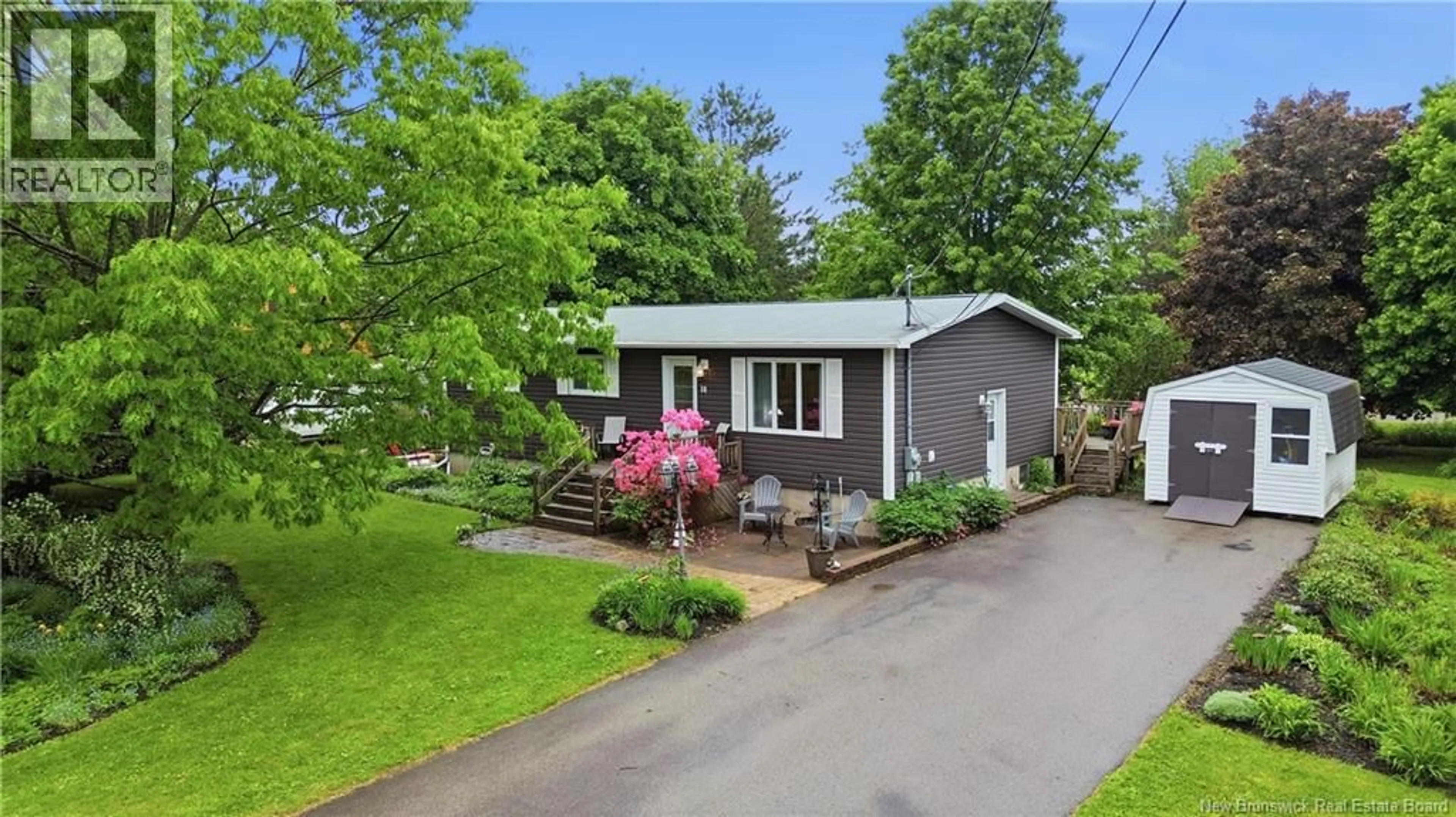 A pic from outside/outdoor area/front of a property/back of a property/a pic from drone, street for 16 WEBSTER AVENUE, Sussex Corner New Brunswick E4E3A5