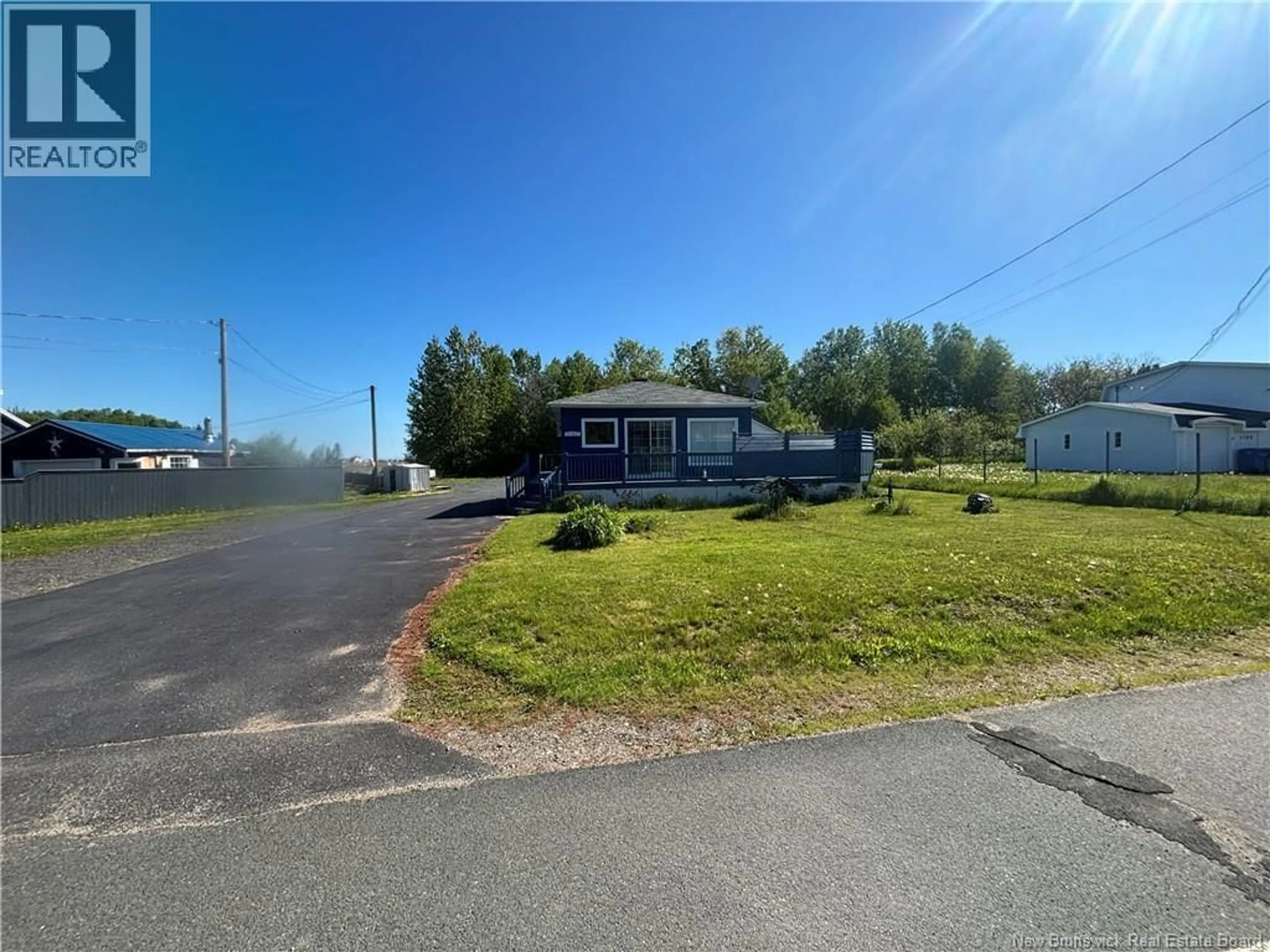 A pic from outside/outdoor area/front of a property/back of a property/a pic from drone, street for 1181 RUE BRYAR, Beresford New Brunswick E8K1B2