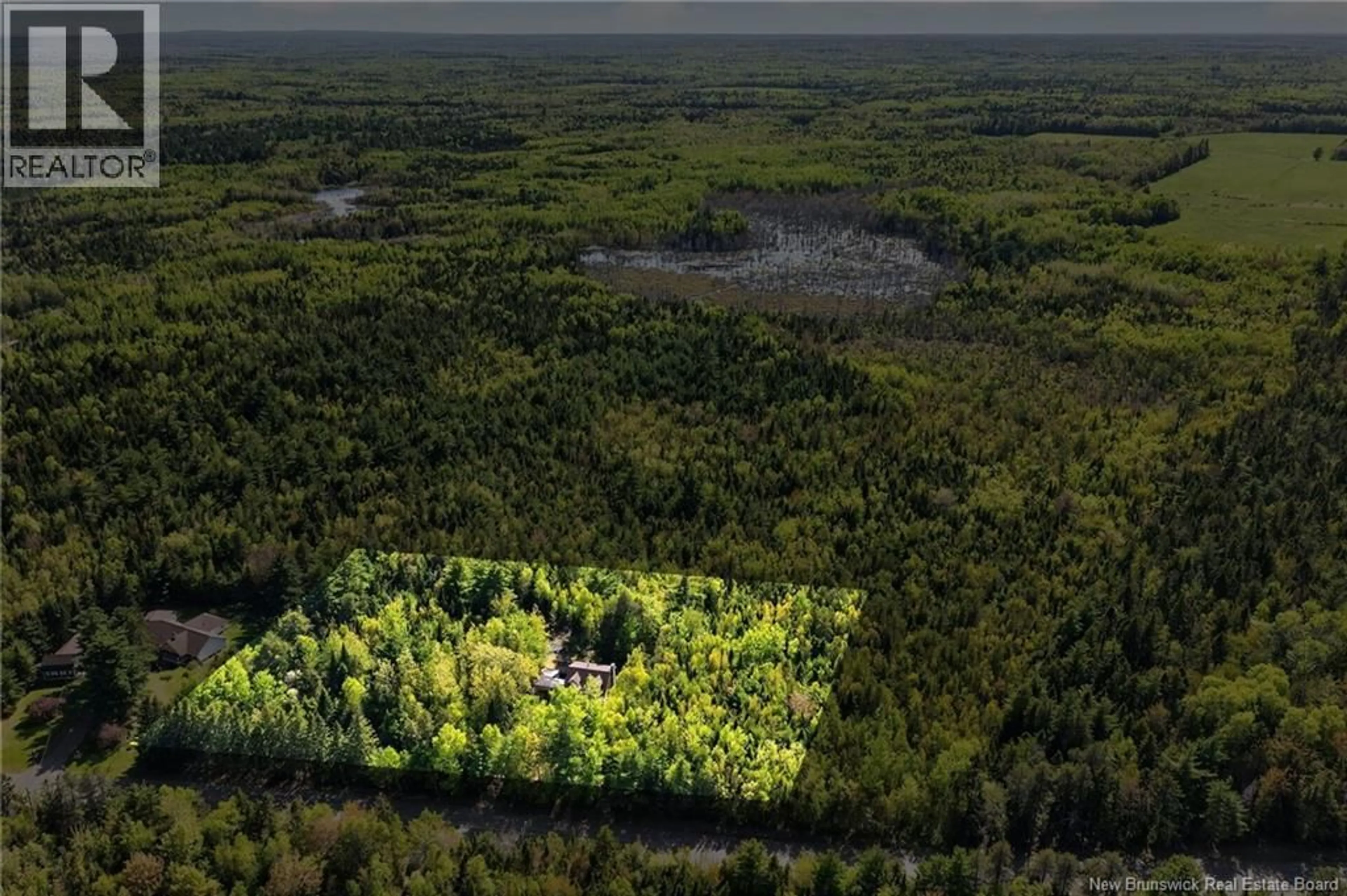 A pic from outside/outdoor area/front of a property/back of a property/a pic from drone, forest/trees view for 5384 ROUTE 134, Cocagne New Brunswick E4R3P1