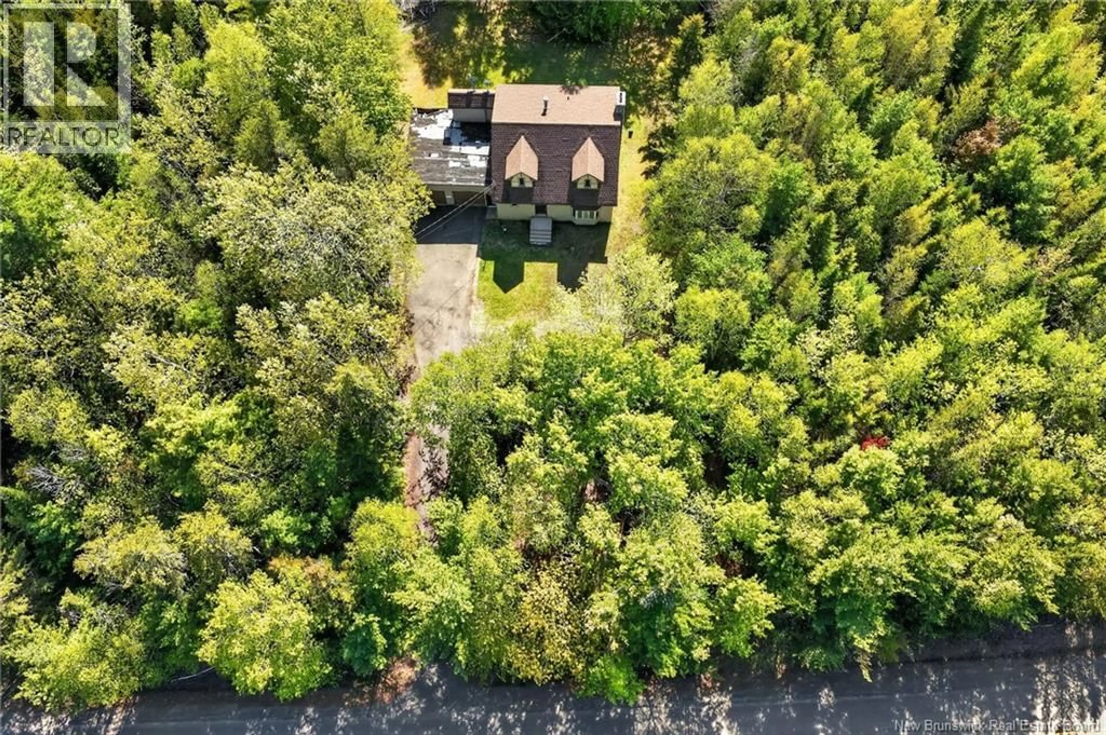 A pic from outside/outdoor area/front of a property/back of a property/a pic from drone, forest/trees view for 5384 ROUTE 134, Cocagne New Brunswick E4R3P1