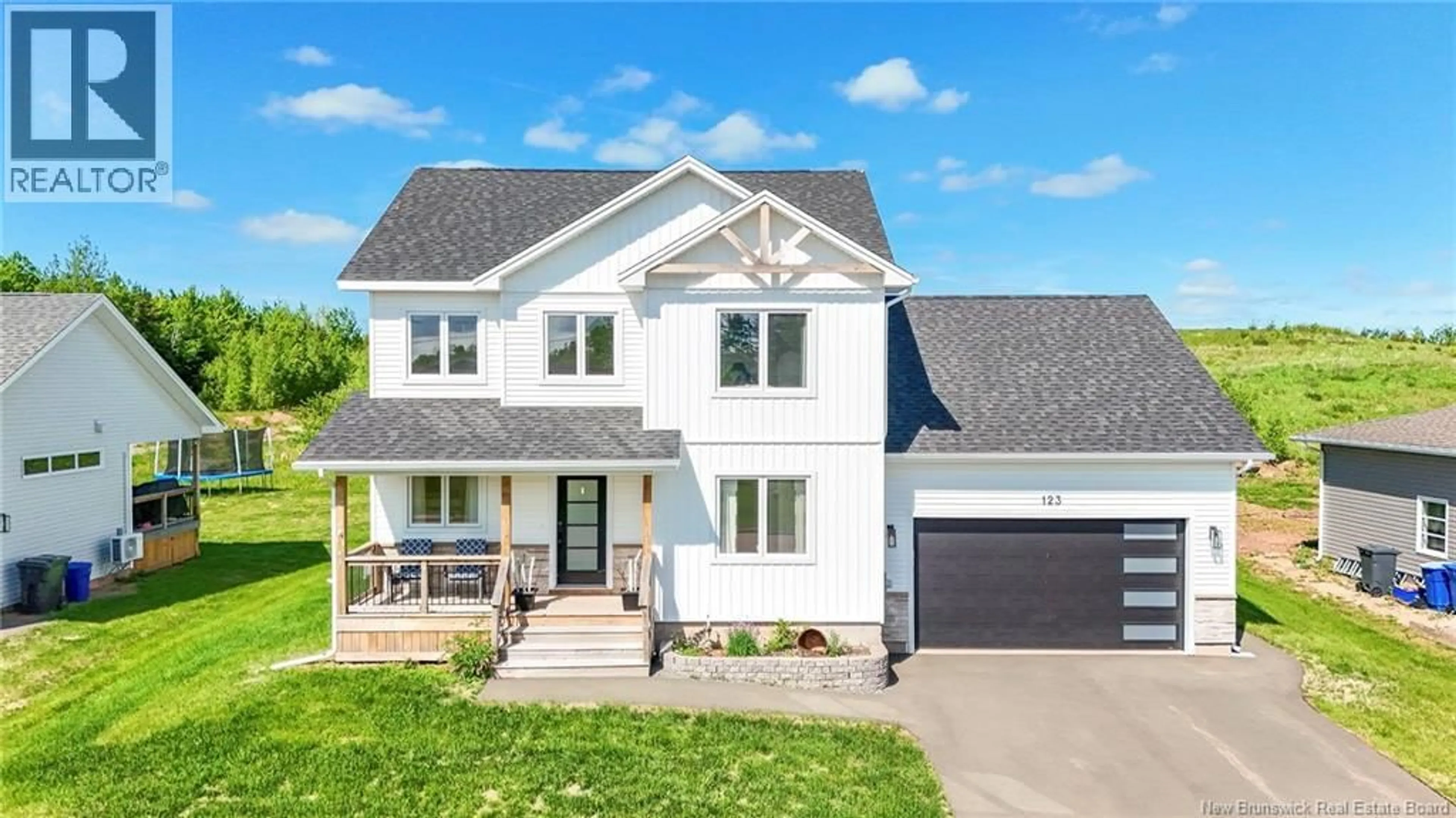 Home with vinyl exterior material, street for 123 KING'S BRIDGE BOULEVARD, Moncton New Brunswick E1G5R7