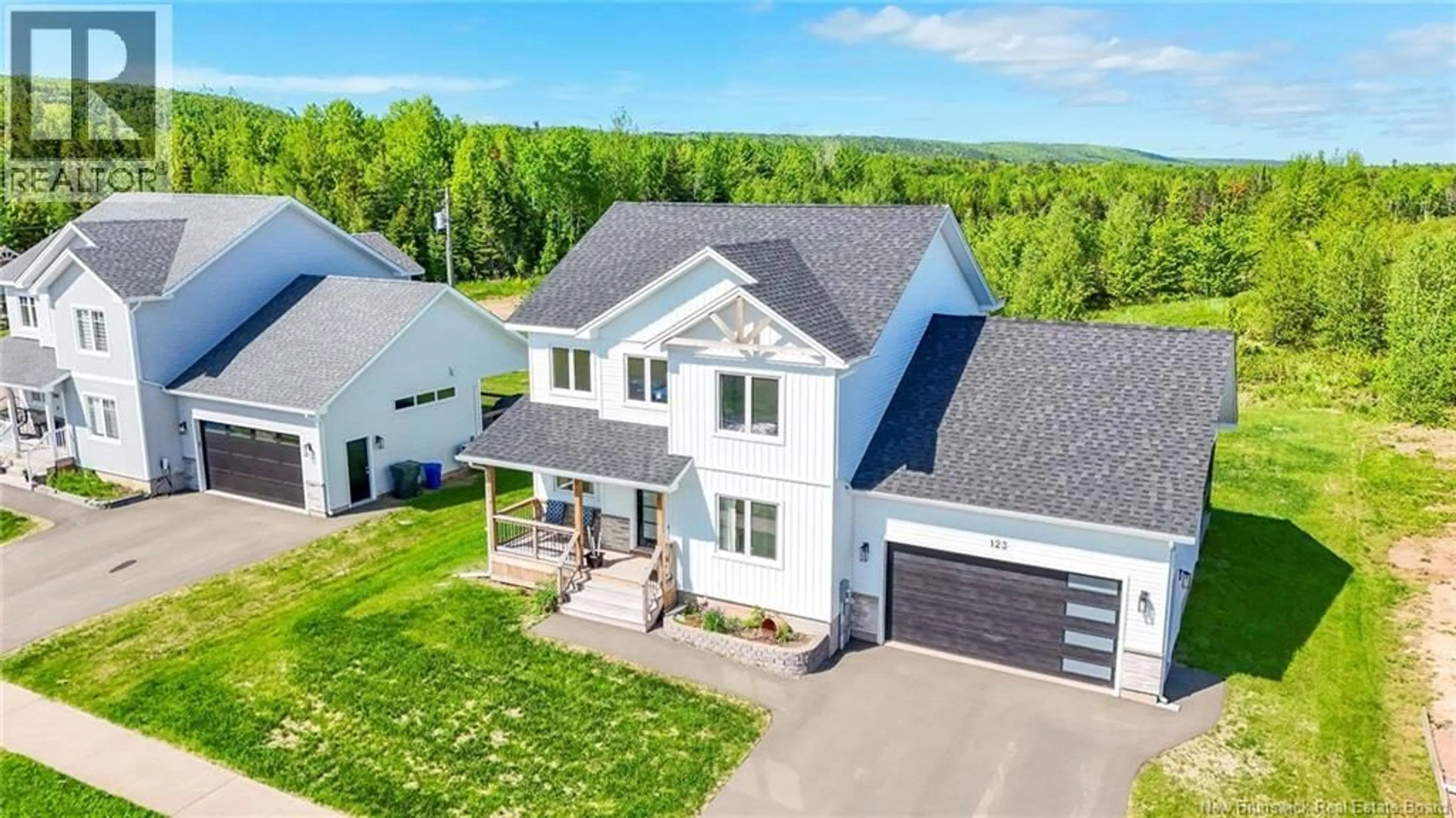 A pic from outside/outdoor area/front of a property/back of a property/a pic from drone, unknown for 123 KING'S BRIDGE BOULEVARD, Moncton New Brunswick E1G5R7