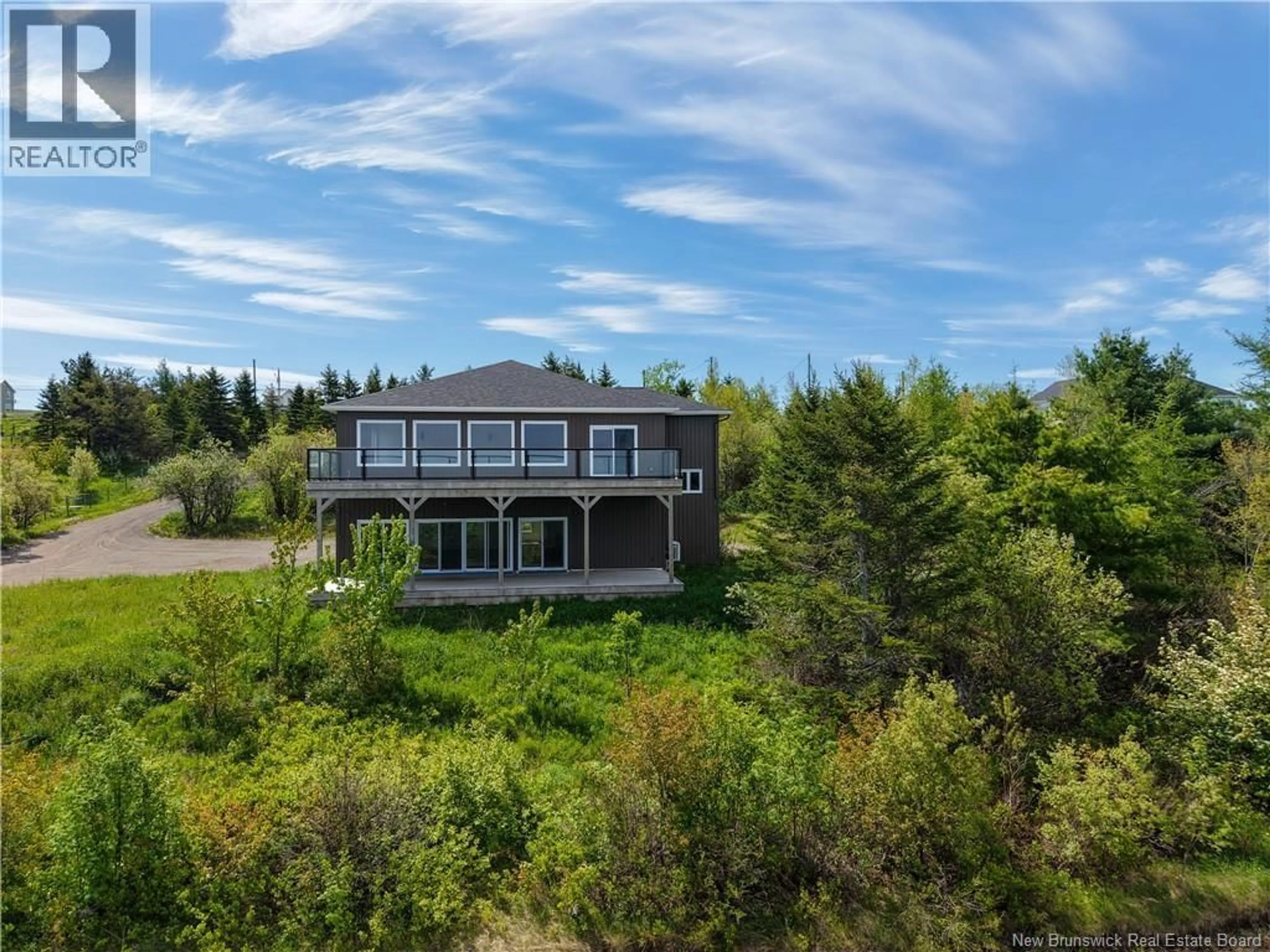 A pic from outside/outdoor area/front of a property/back of a property/a pic from drone, water/lake/river/ocean view for 824 INDIAN MOUNTAIN ROAD, Moncton New Brunswick E1G3M9