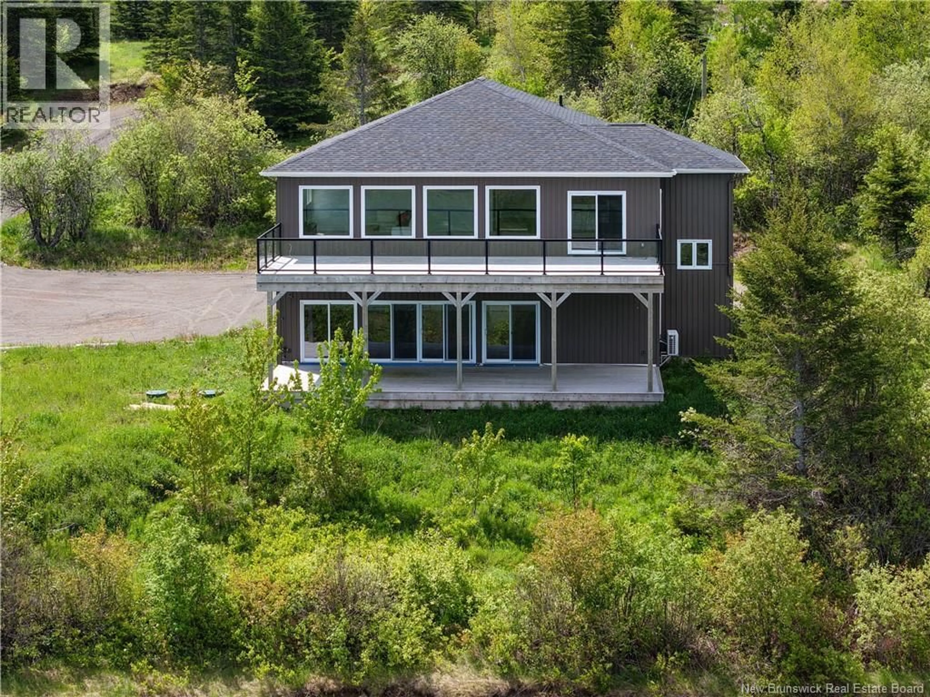 A pic from outside/outdoor area/front of a property/back of a property/a pic from drone, water/lake/river/ocean view for 824 INDIAN MOUNTAIN ROAD, Moncton New Brunswick E1G3M9