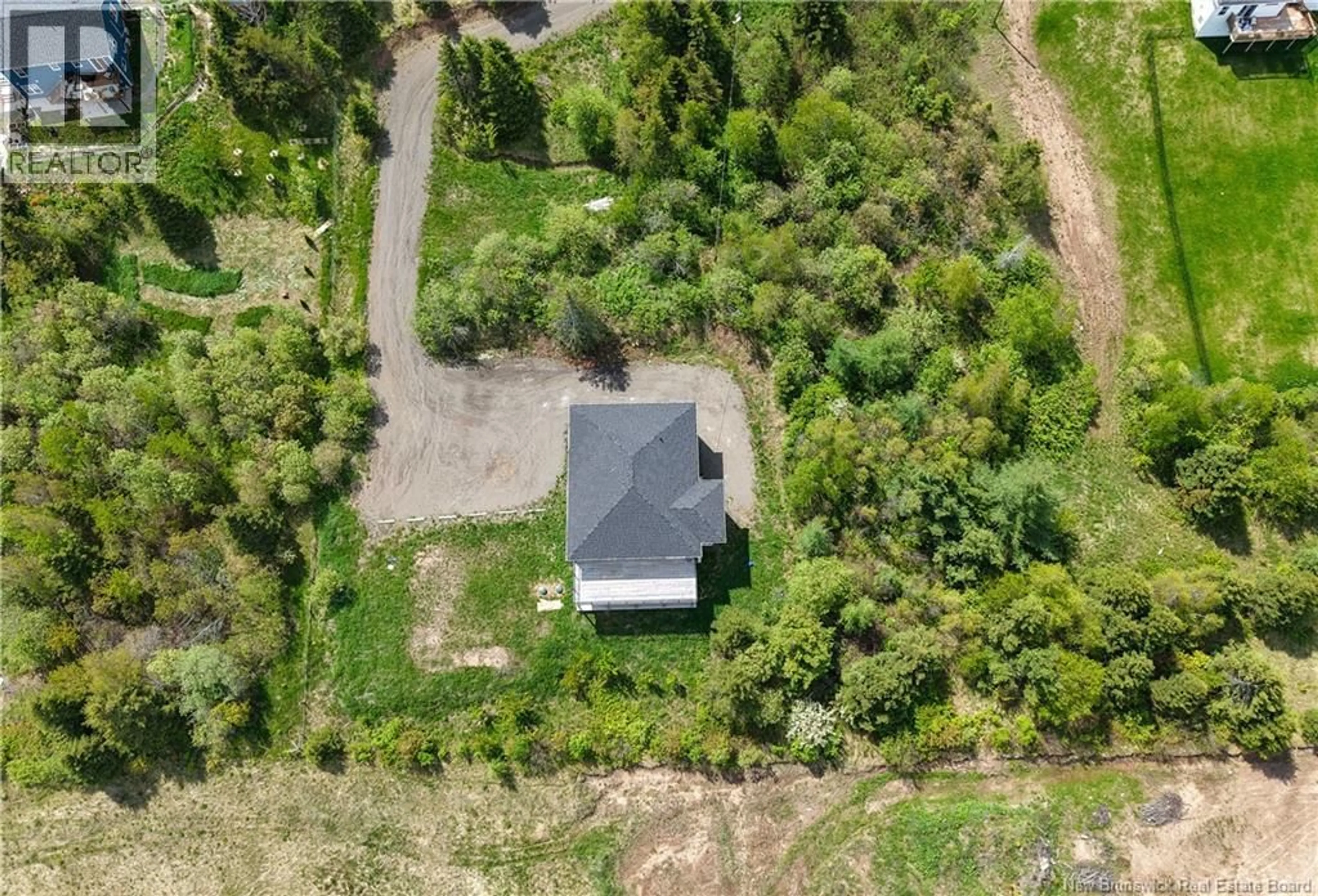 A pic from outside/outdoor area/front of a property/back of a property/a pic from drone, street for 824 INDIAN MOUNTAIN ROAD, Moncton New Brunswick E1G3M9