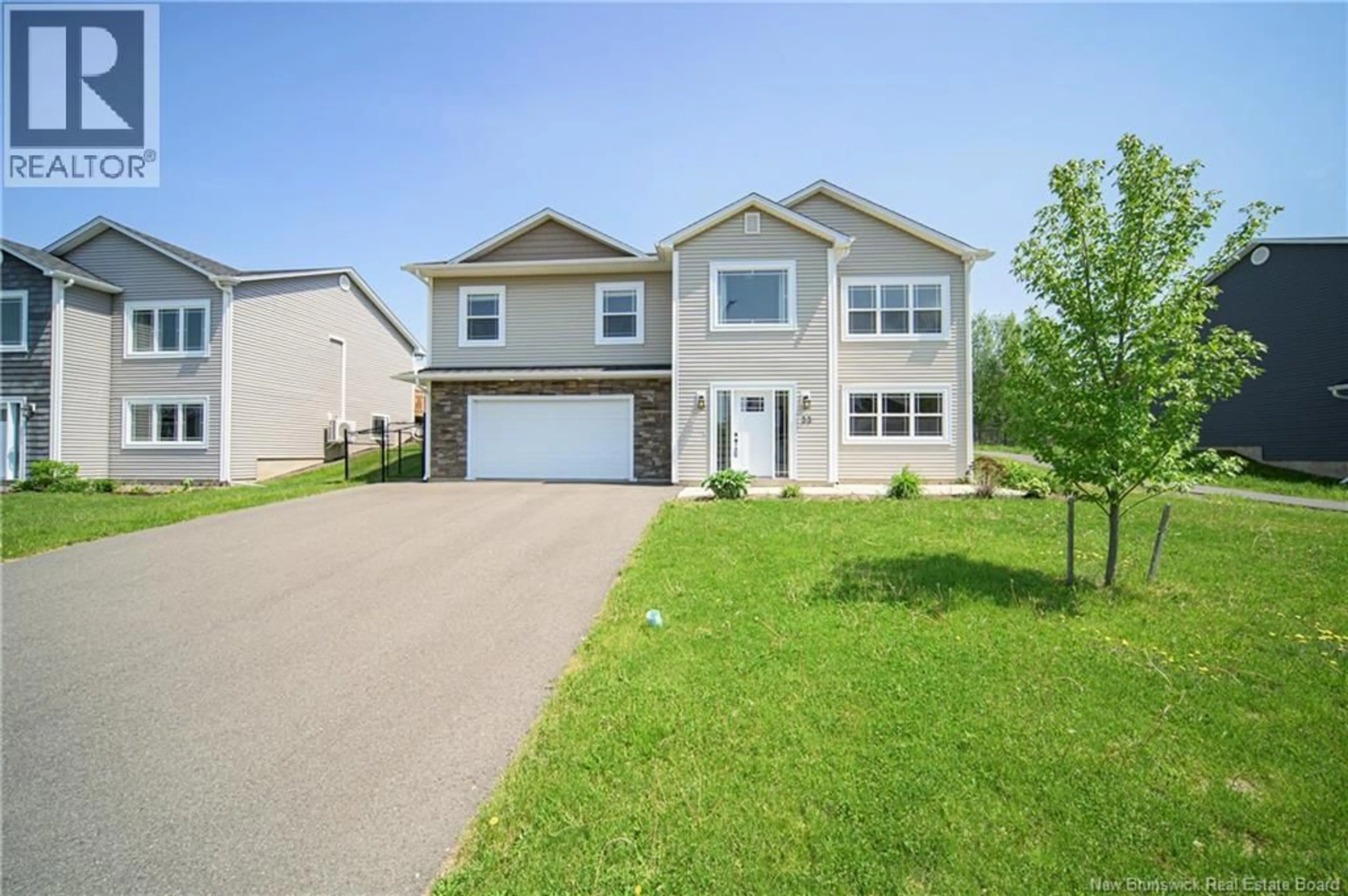 Home with vinyl exterior material, street for 33 DOHERTY DRIVE, Oromocto New Brunswick E2V0M7