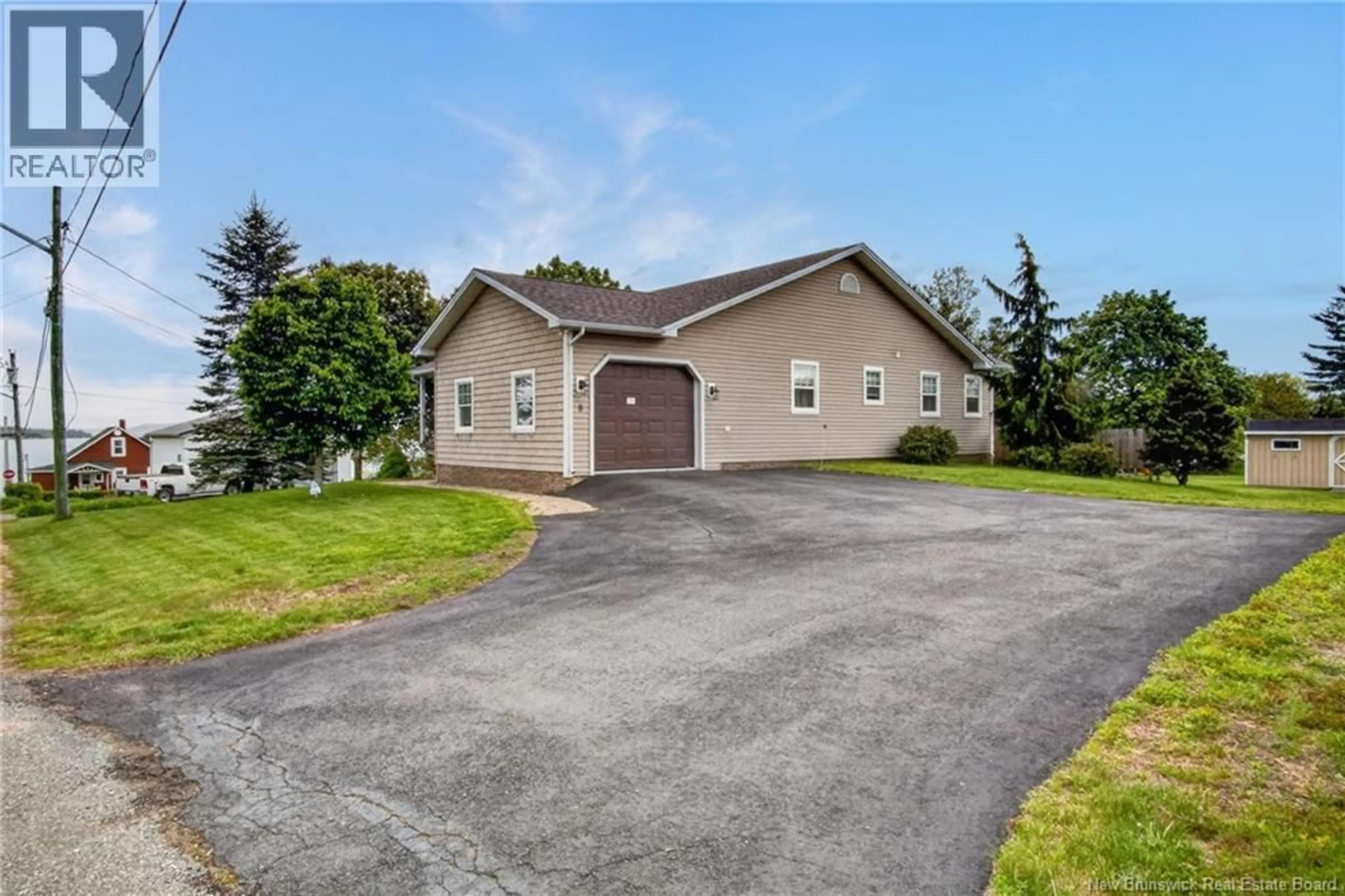A pic from outside/outdoor area/front of a property/back of a property/a pic from drone, street for 8 HARRIS ROAD, Grand Bay-Westfield New Brunswick E5K1N2