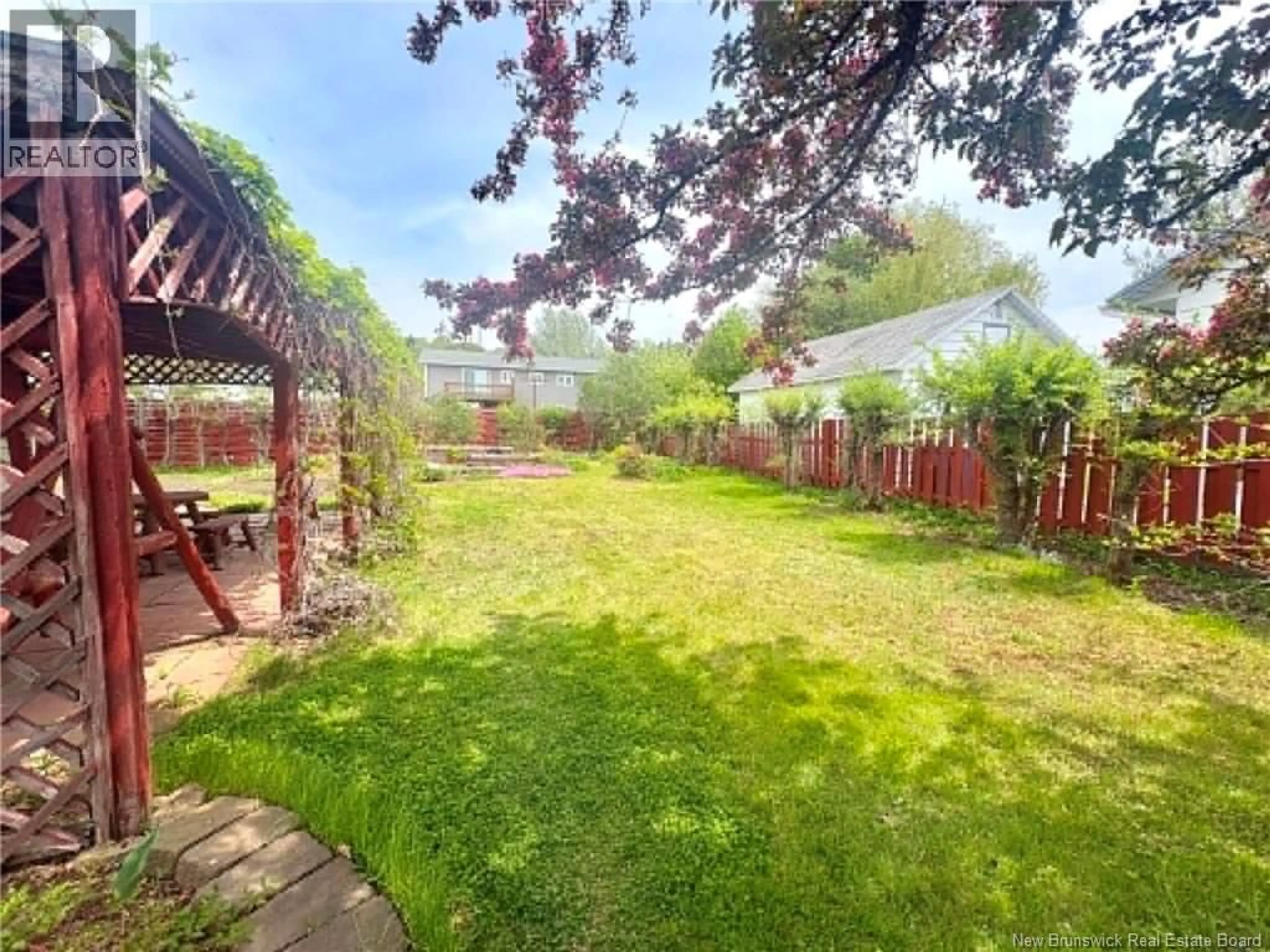 A pic from outside/outdoor area/front of a property/back of a property/a pic from drone, forest/trees view for 45 PARKSIDE STREET, Atholville New Brunswick E3N4A3