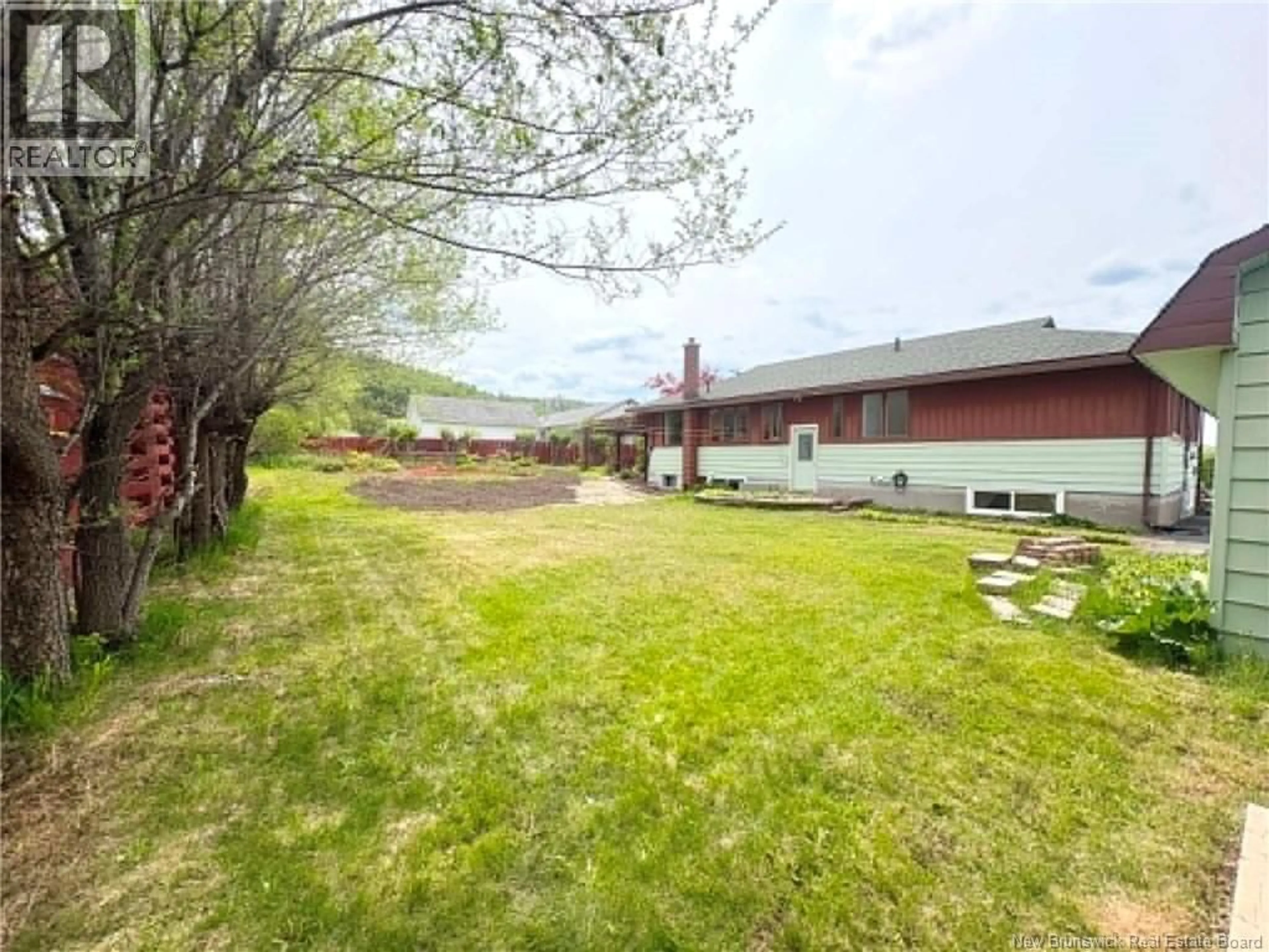 A pic from outside/outdoor area/front of a property/back of a property/a pic from drone, mountain view for 45 PARKSIDE STREET, Atholville New Brunswick E3N4A3