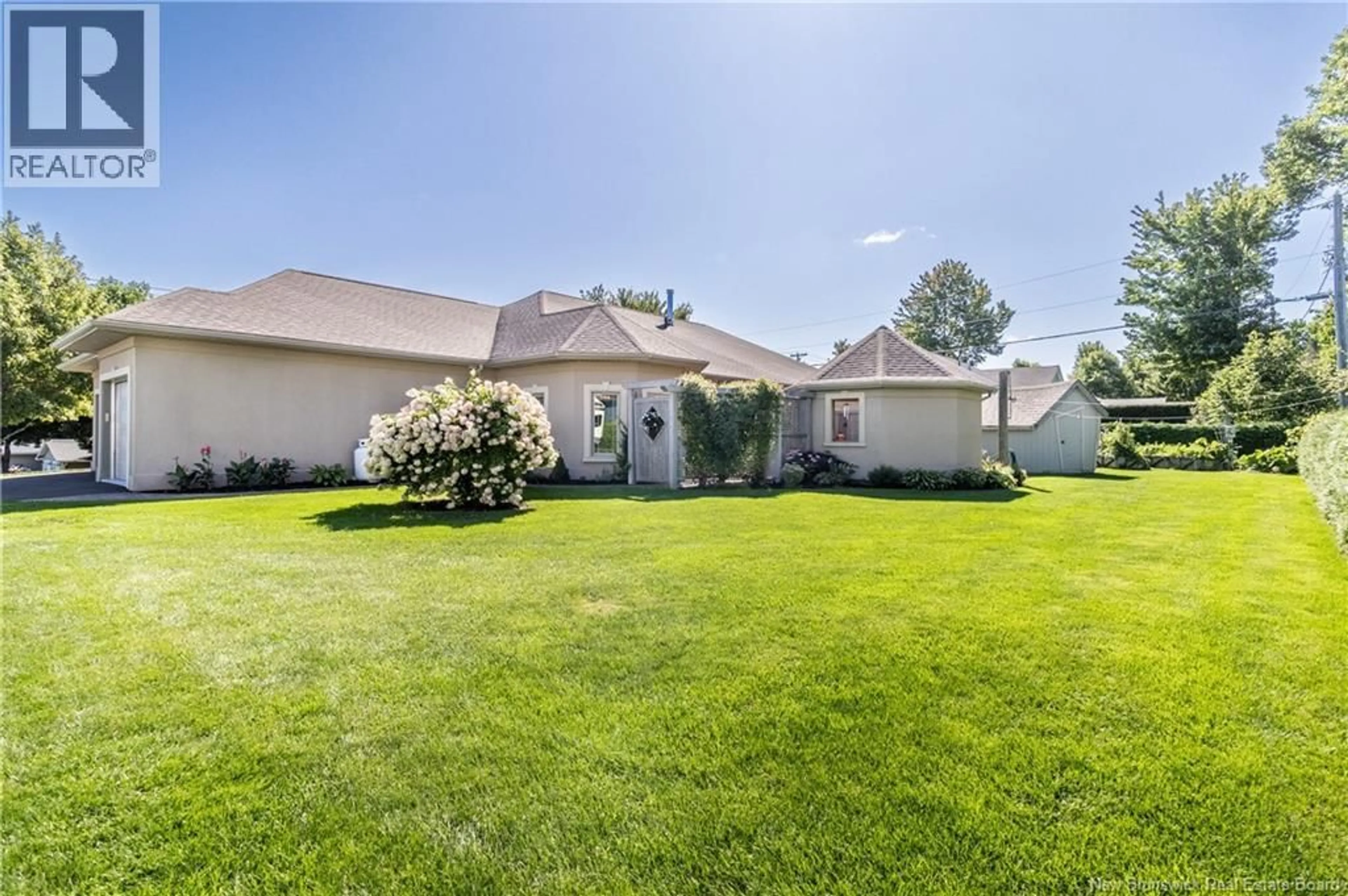 A pic from outside/outdoor area/front of a property/back of a property/a pic from drone, water/lake/river/ocean view for 131 CREIGHTON STREET, Woodstock New Brunswick E7M1M9