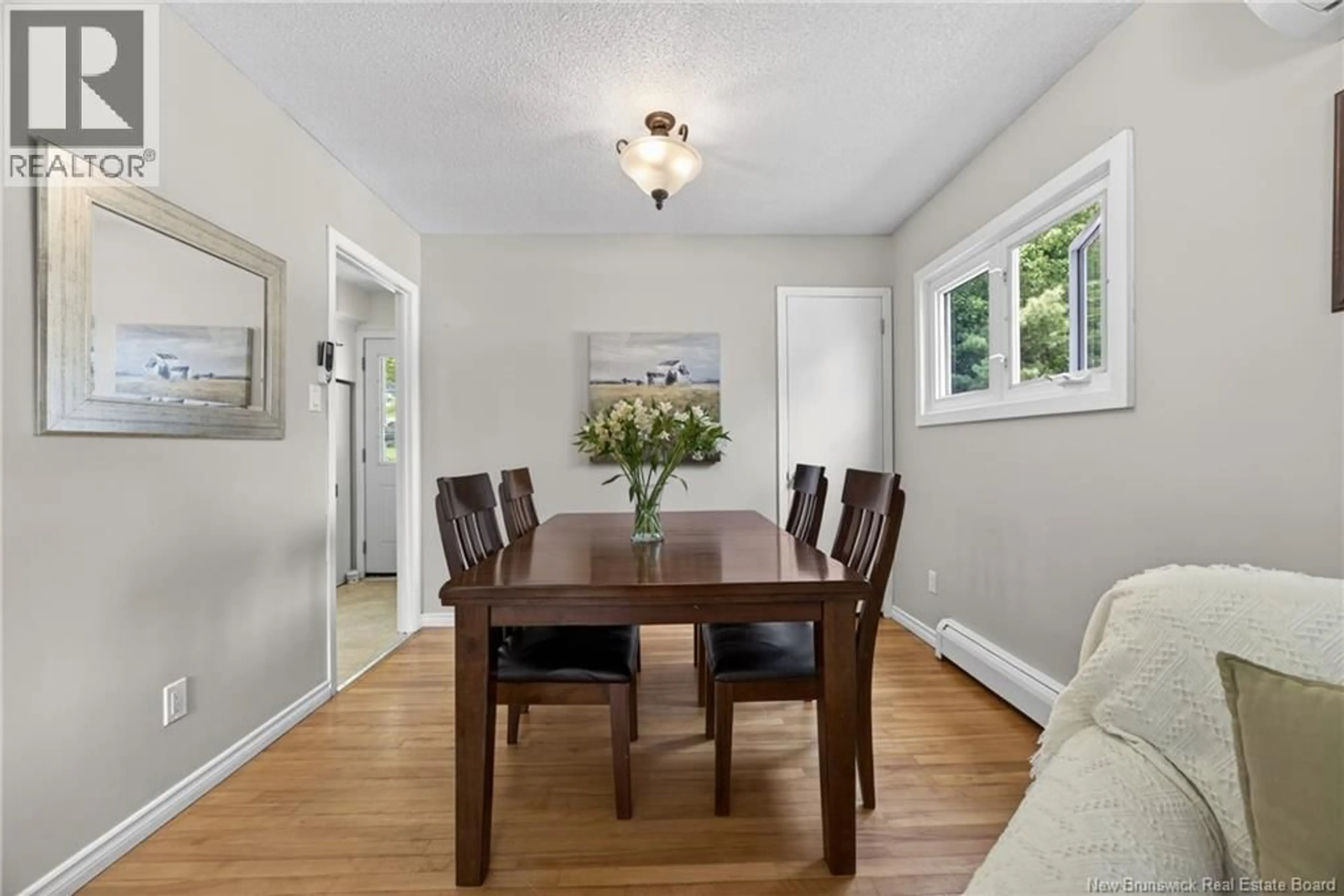 Dining room, wood/laminate floor for 273 WOODBRIDGE, Fredericton New Brunswick E3B4R4