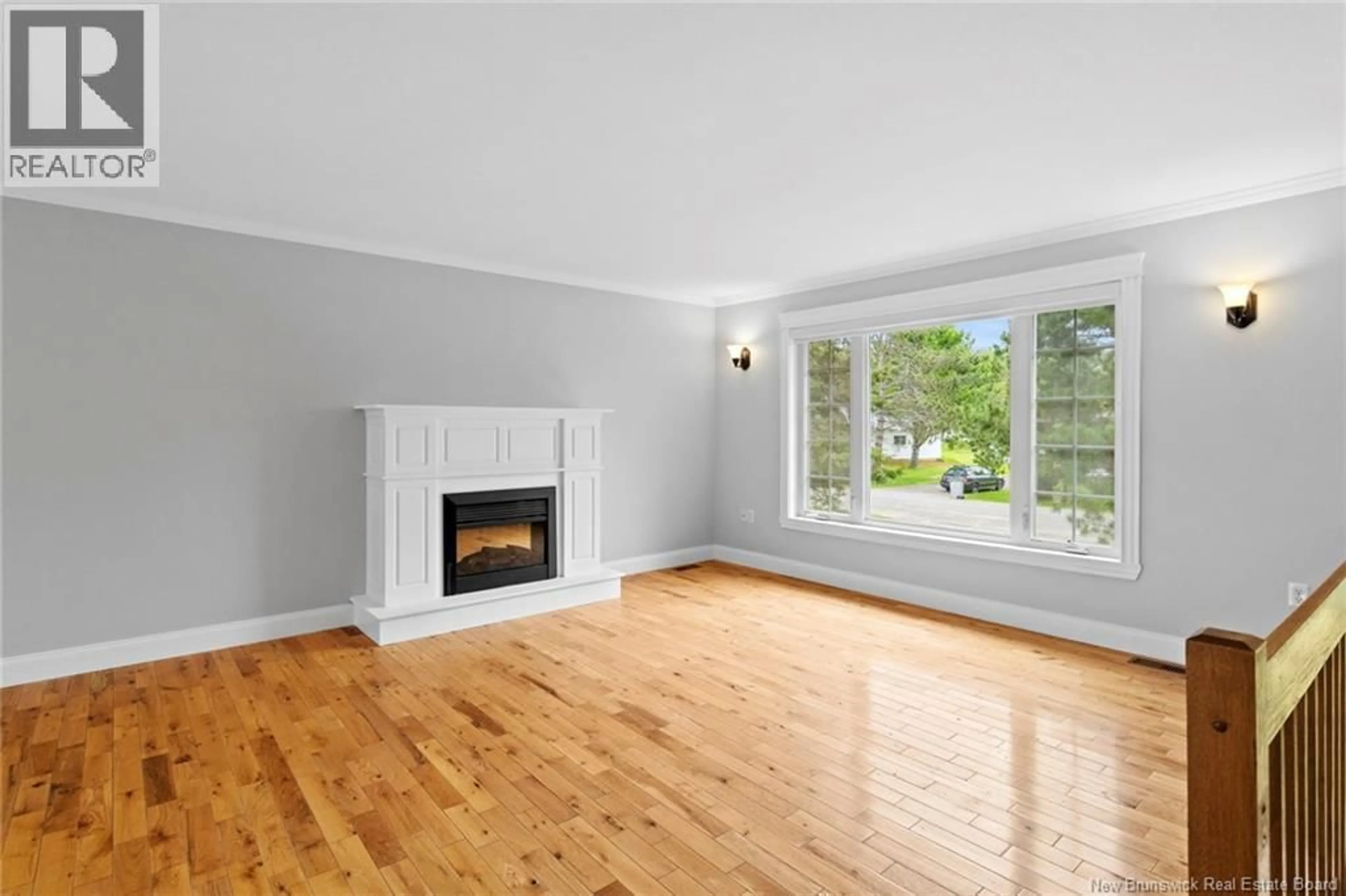 Living room with furniture, wood/laminate floor for 38 FOSTER AVENUE, Burtts Corner New Brunswick E6L2C5
