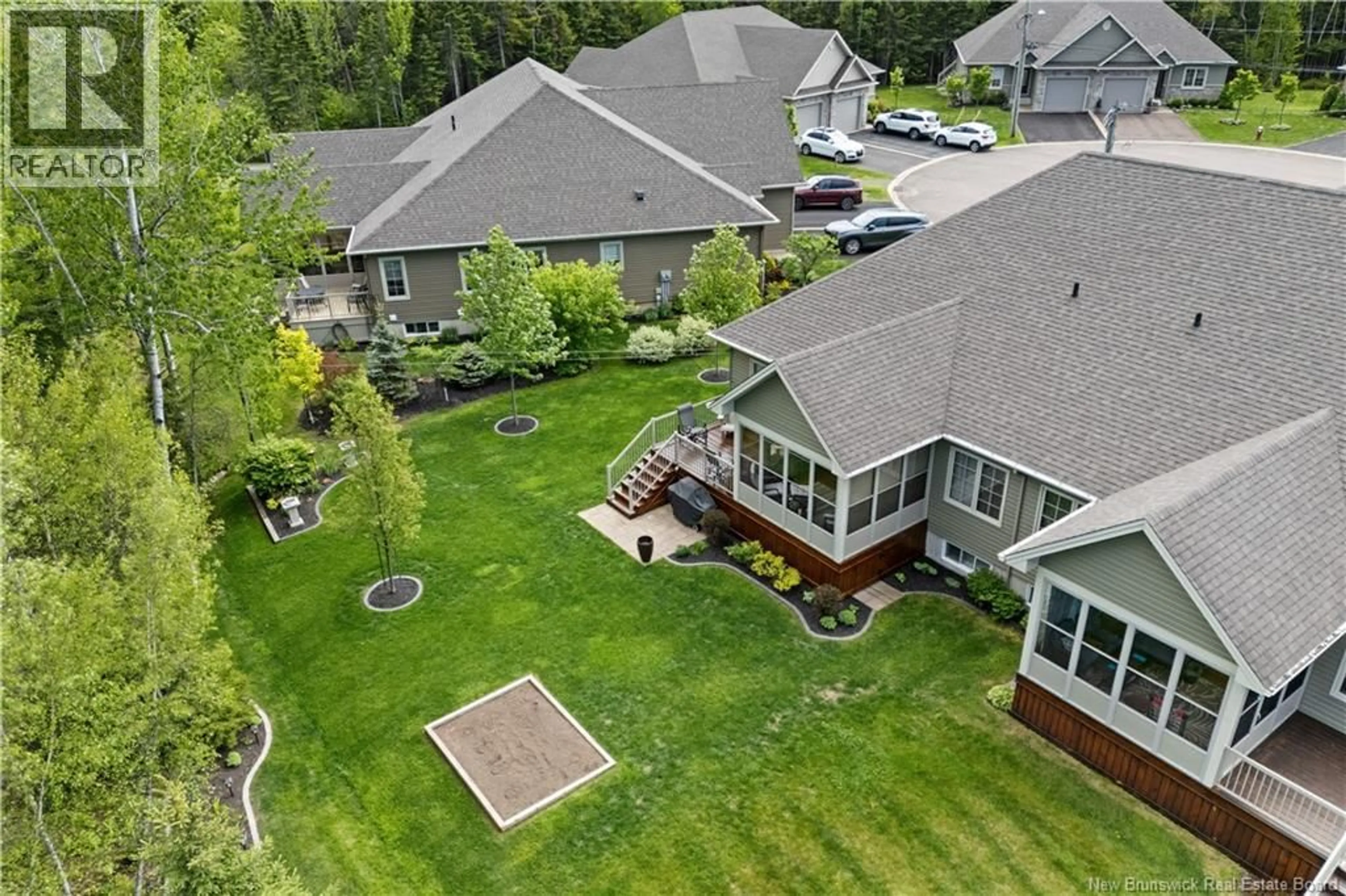 A pic from outside/outdoor area/front of a property/back of a property/a pic from drone, mountain view for 66 RUELLE DE LA CONSERVATION COURT, Dieppe New Brunswick E1A9T7