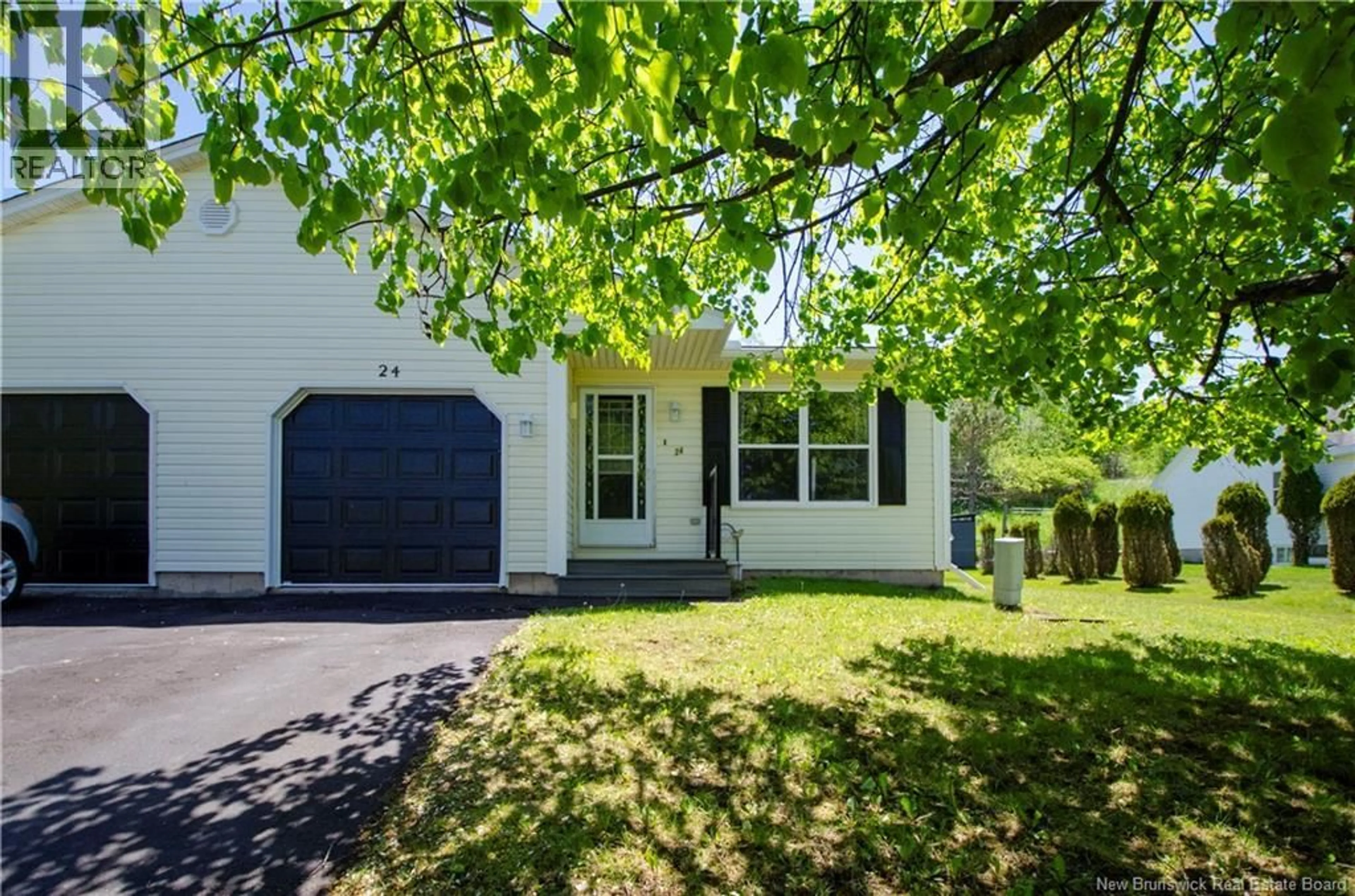 Home with vinyl exterior material, street for 24 THISTLE STREET, Saint John New Brunswick E2M5T1