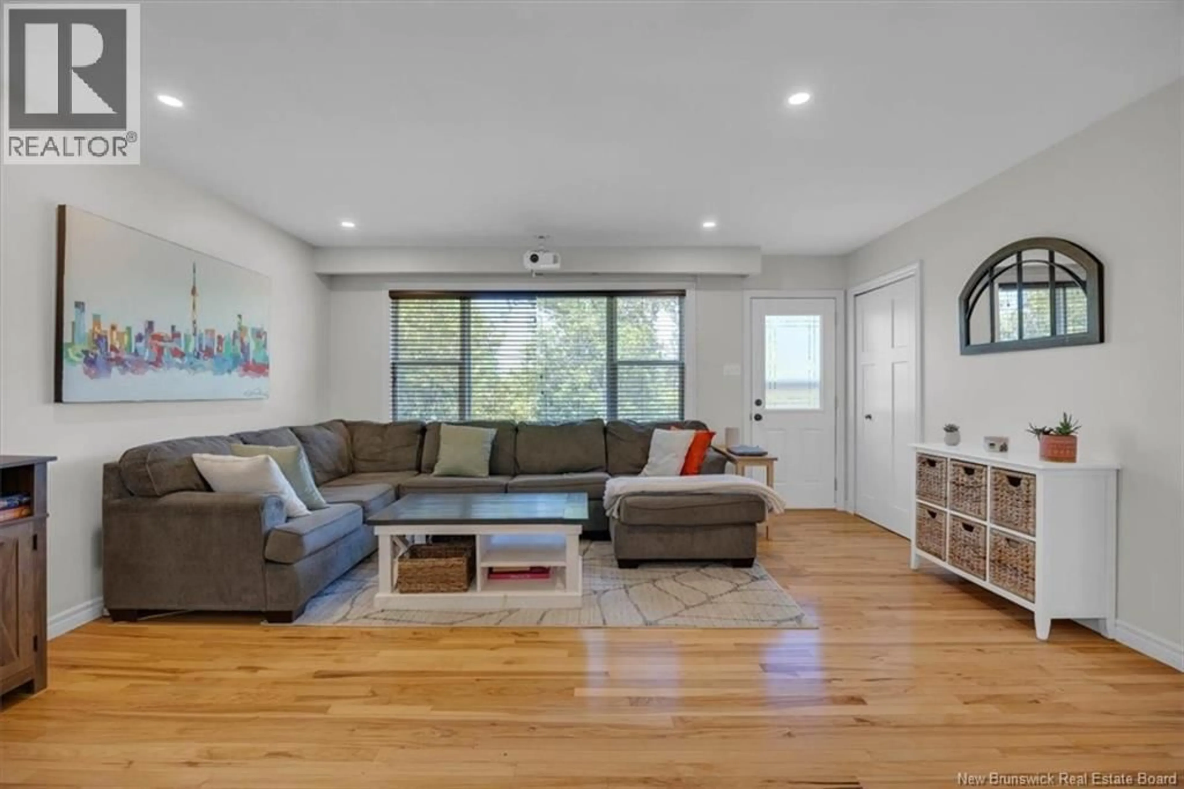Living room with furniture, wood/laminate floor for 56 VILLA DRIVE, Hampton New Brunswick E5N5G1