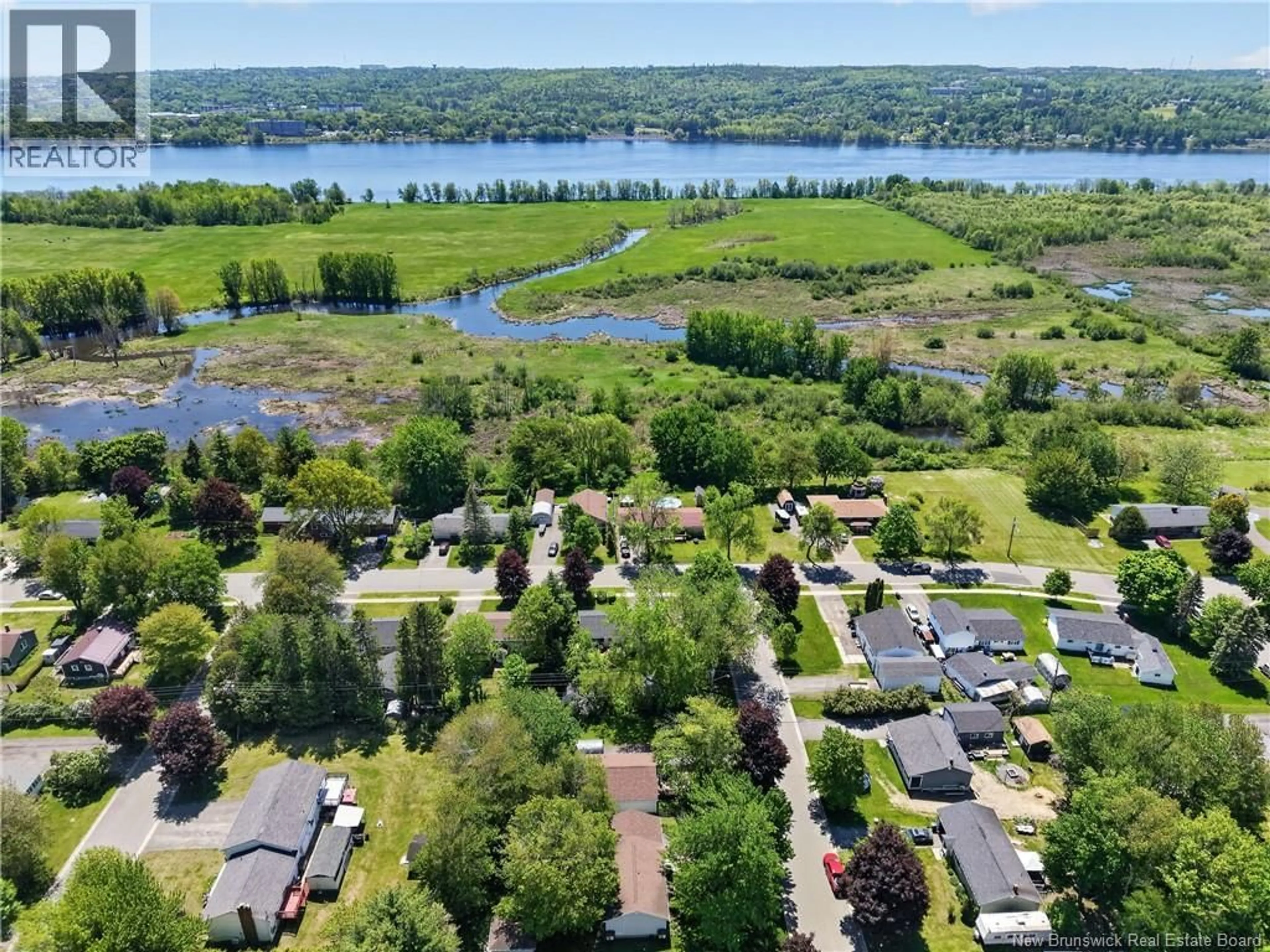 A pic from outside/outdoor area/front of a property/back of a property/a pic from drone, water/lake/river/ocean view for 45 CAROL AVENUE, Fredericton New Brunswick E3A1K3