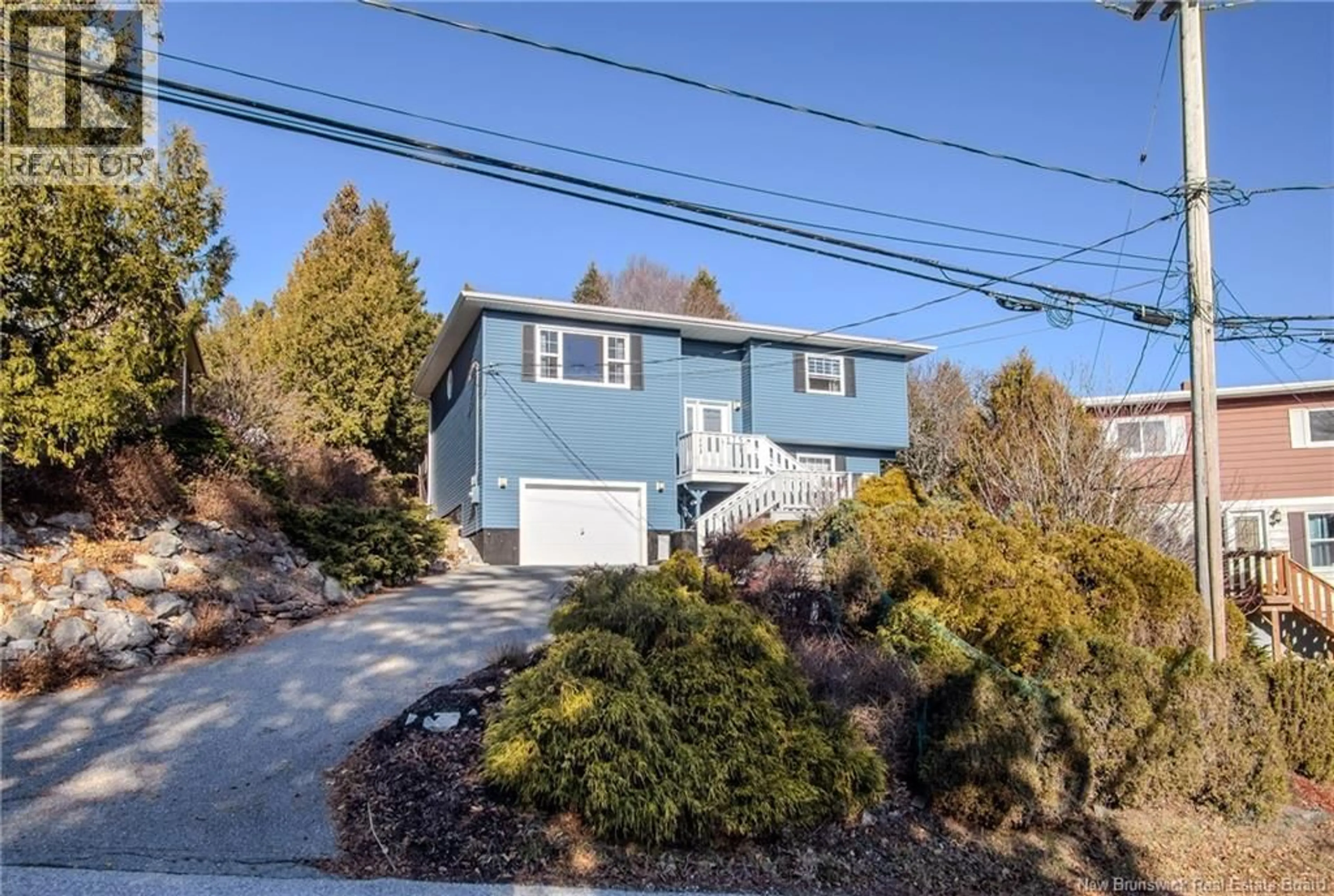 Home with vinyl exterior material, street for 175 HIGHLAND ROAD, Saint John New Brunswick E2K1P8