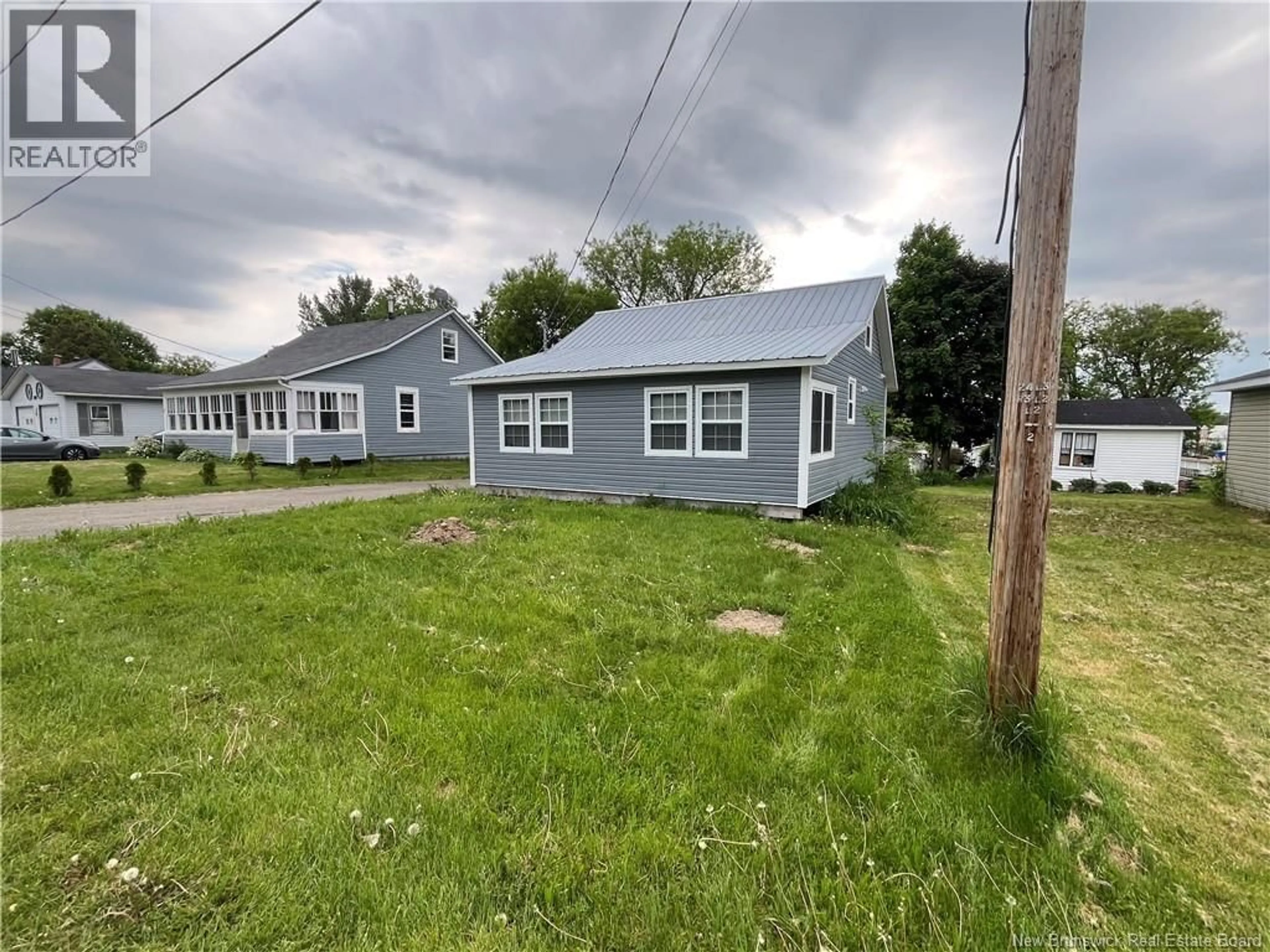 A pic from outside/outdoor area/front of a property/back of a property/a pic from drone, street for 9 CHURCHILL STREET, Hartland New Brunswick E1N4B8