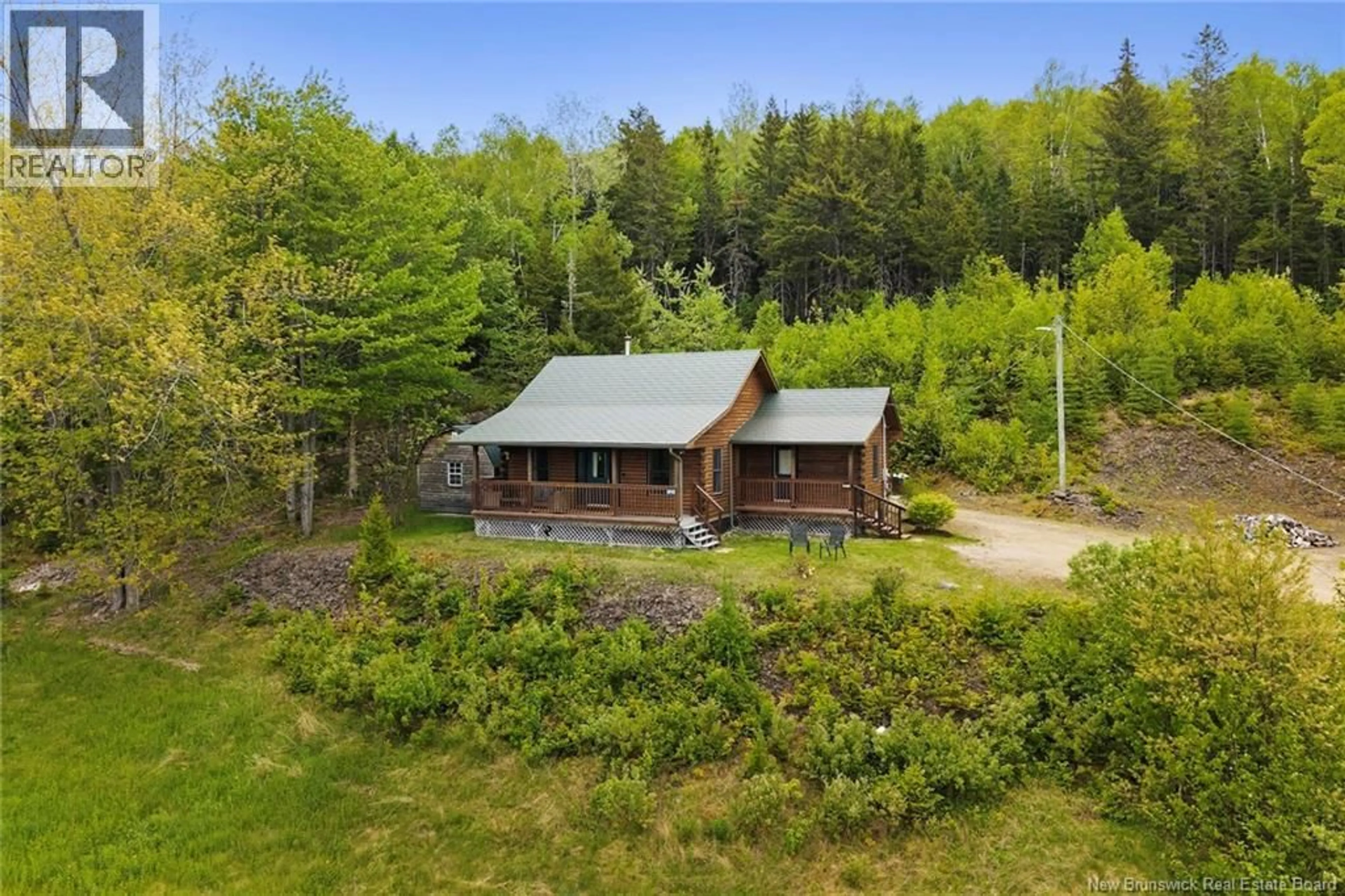 A pic from outside/outdoor area/front of a property/back of a property/a pic from drone, unknown for 6972 ROUTE 8 HWY, Ludlow New Brunswick E9C2P4