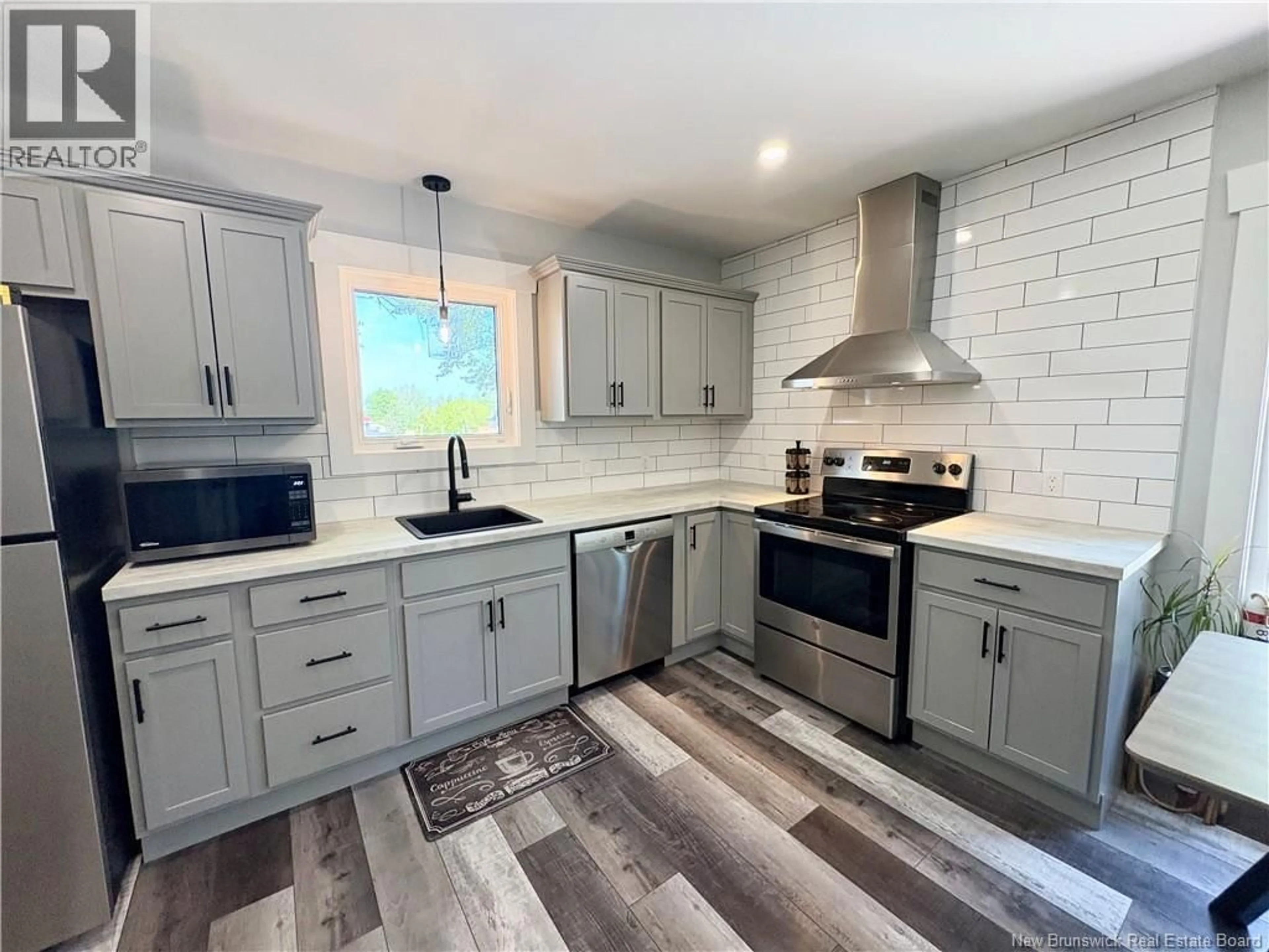Open concept kitchen, ceramic/tile floor for 46 SURETTE, Cocagne New Brunswick E4R3L7