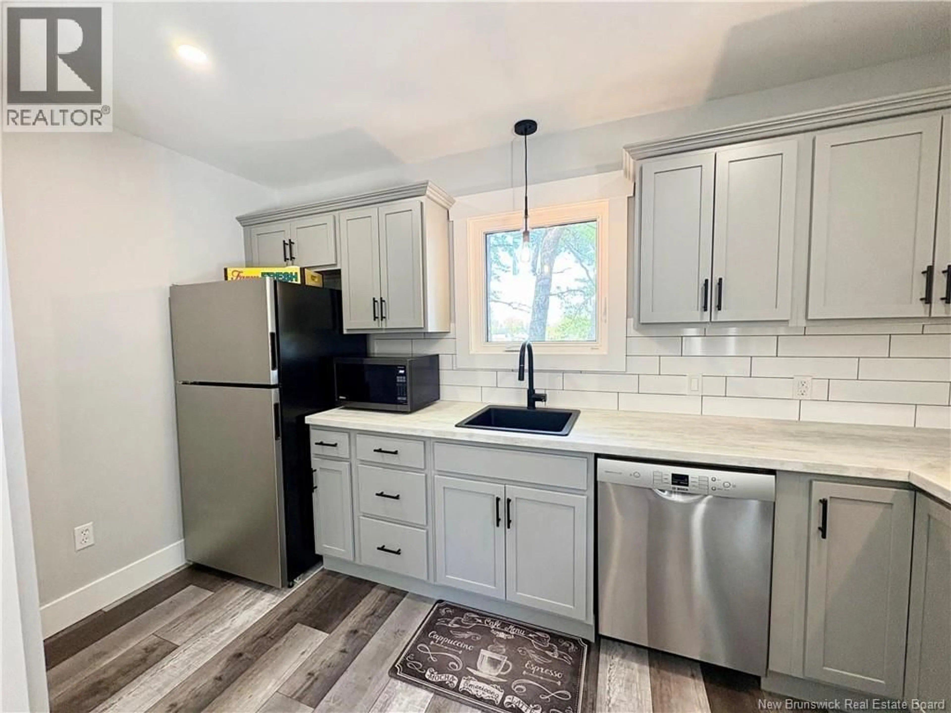Open concept kitchen, ceramic/tile floor for 46 SURETTE, Cocagne New Brunswick E4R3L7