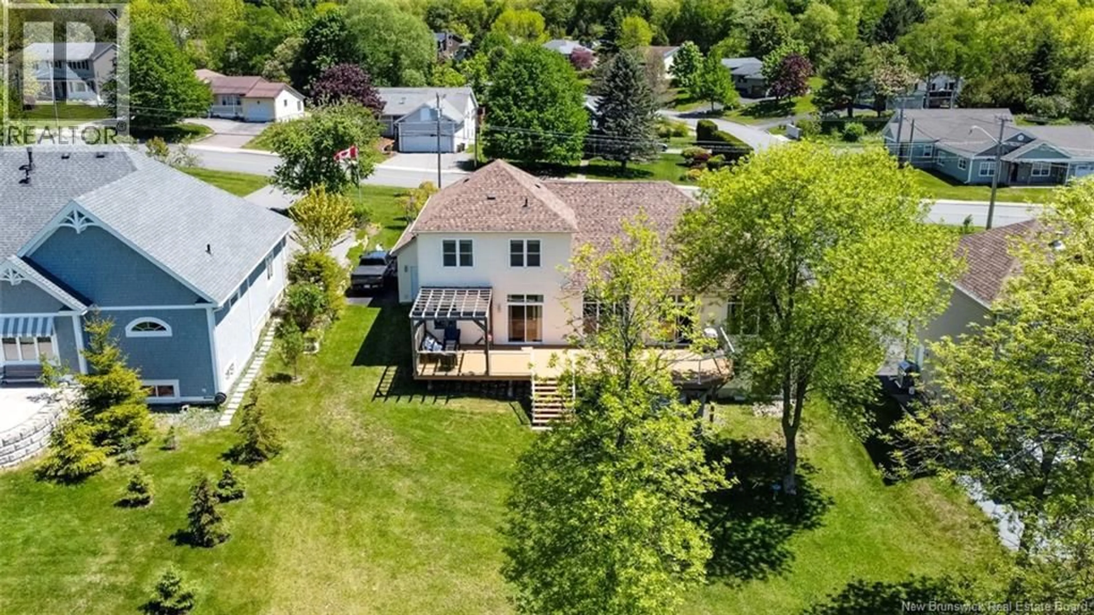 A pic from outside/outdoor area/front of a property/back of a property/a pic from drone, street for 1117 KENNEBECASIS DRIVE, Saint John New Brunswick E2K5A6