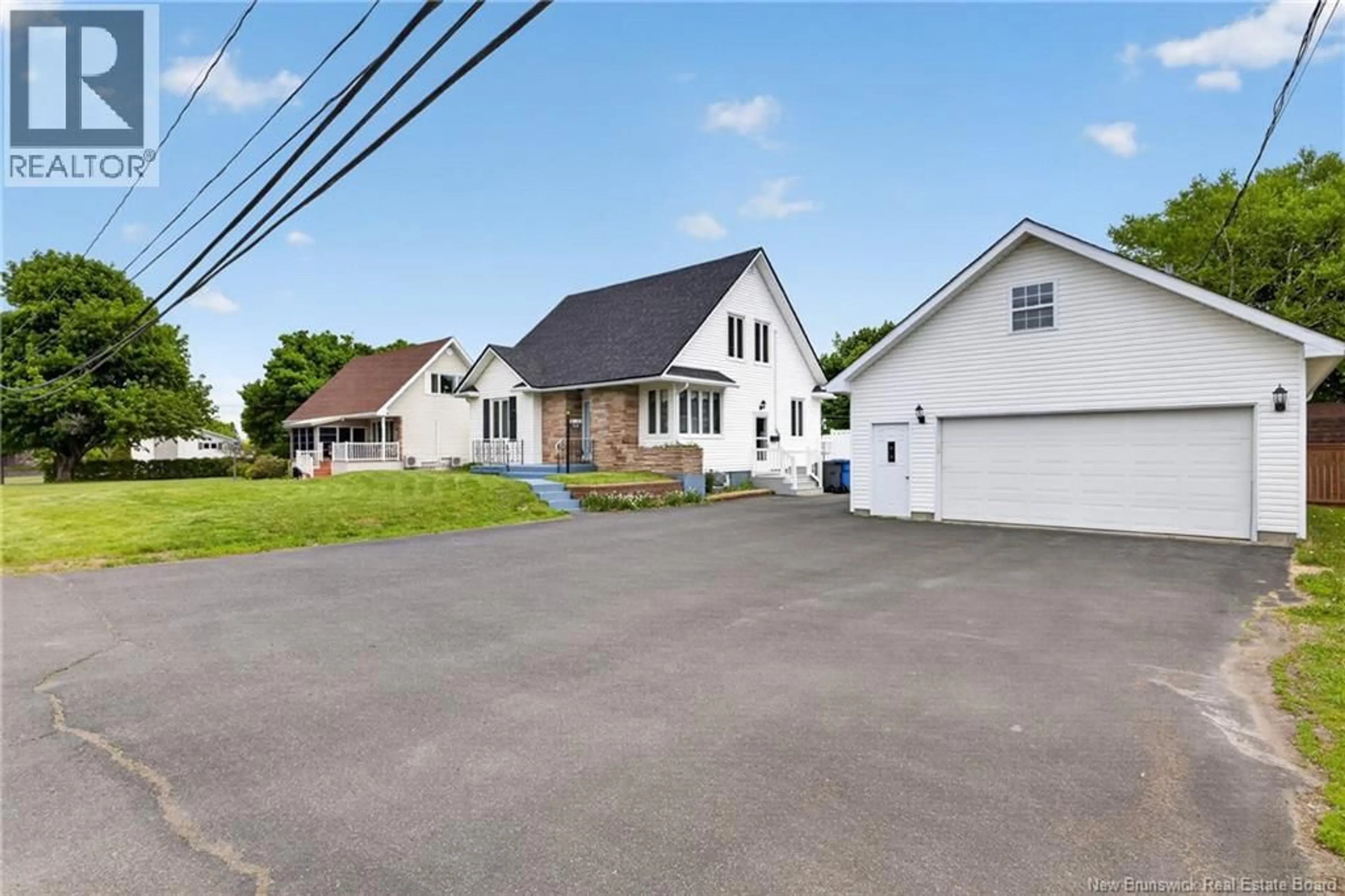A pic from outside/outdoor area/front of a property/back of a property/a pic from drone, street for 3548 RUE CENTENAIRE, Tracadie New Brunswick E1X1B1