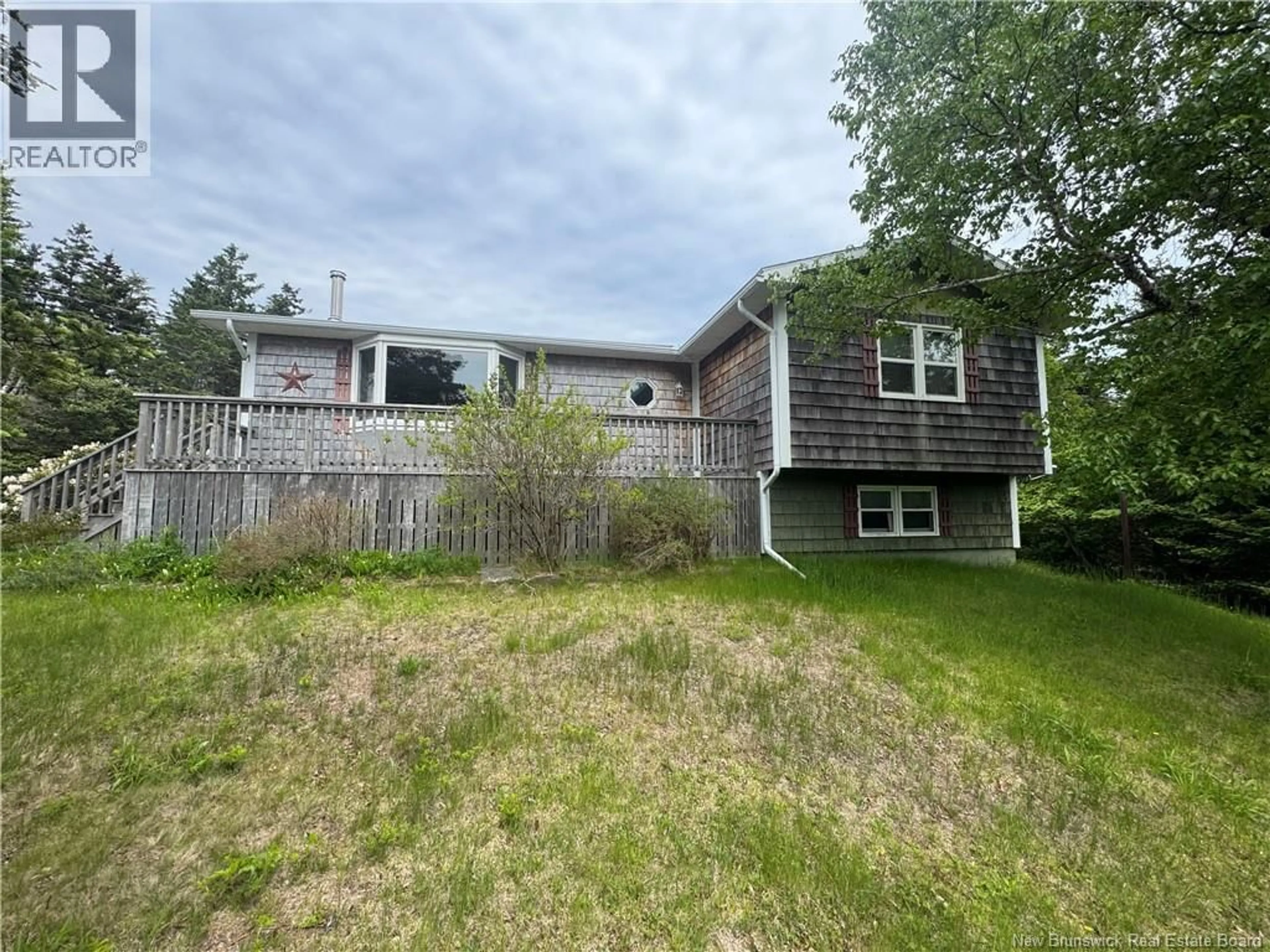 A pic from outside/outdoor area/front of a property/back of a property/a pic from drone, unknown for 208 WHISTLE ROAD, Grand Manan New Brunswick E5G1B5