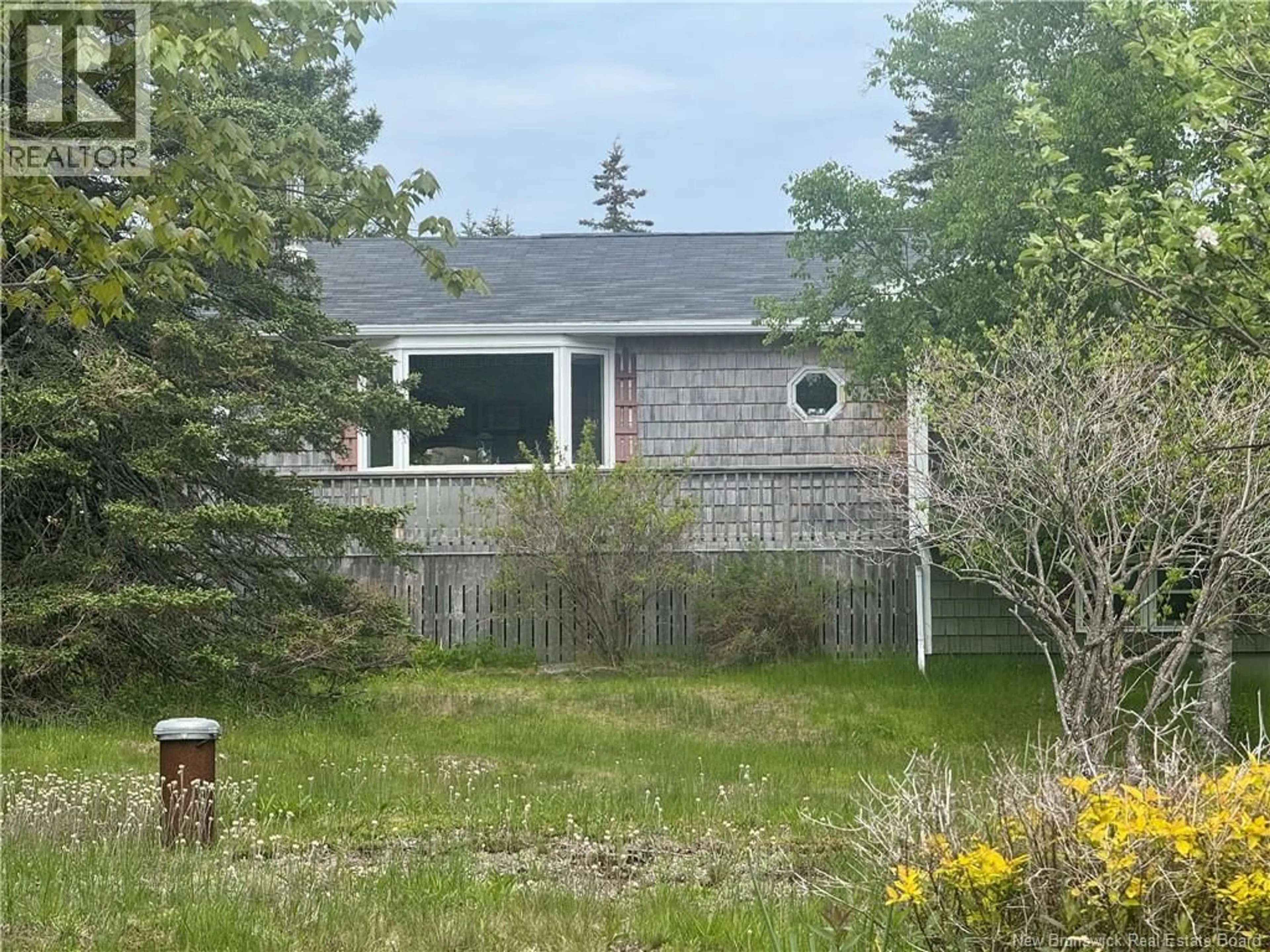 A pic from outside/outdoor area/front of a property/back of a property/a pic from drone, unknown for 208 WHISTLE ROAD, Grand Manan New Brunswick E5G1B5