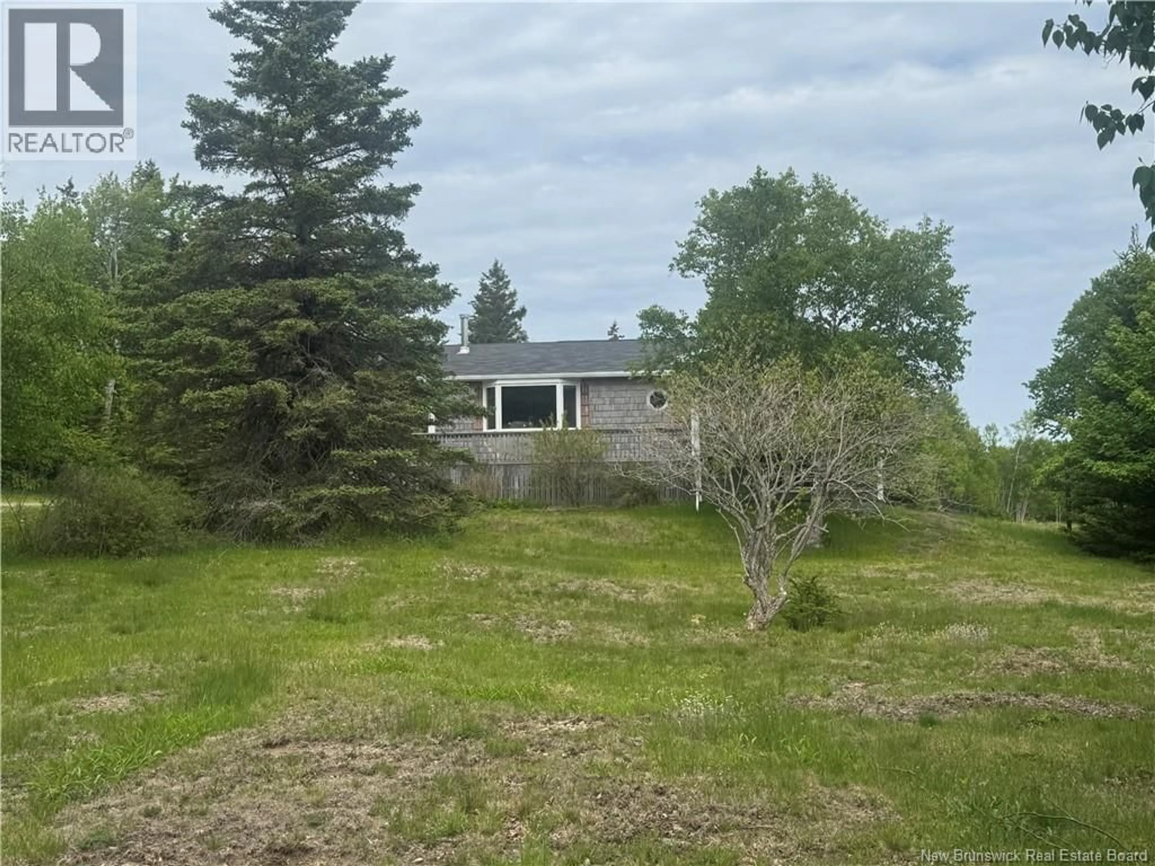 A pic from outside/outdoor area/front of a property/back of a property/a pic from drone, unknown for 208 WHISTLE ROAD, Grand Manan New Brunswick E5G1B5