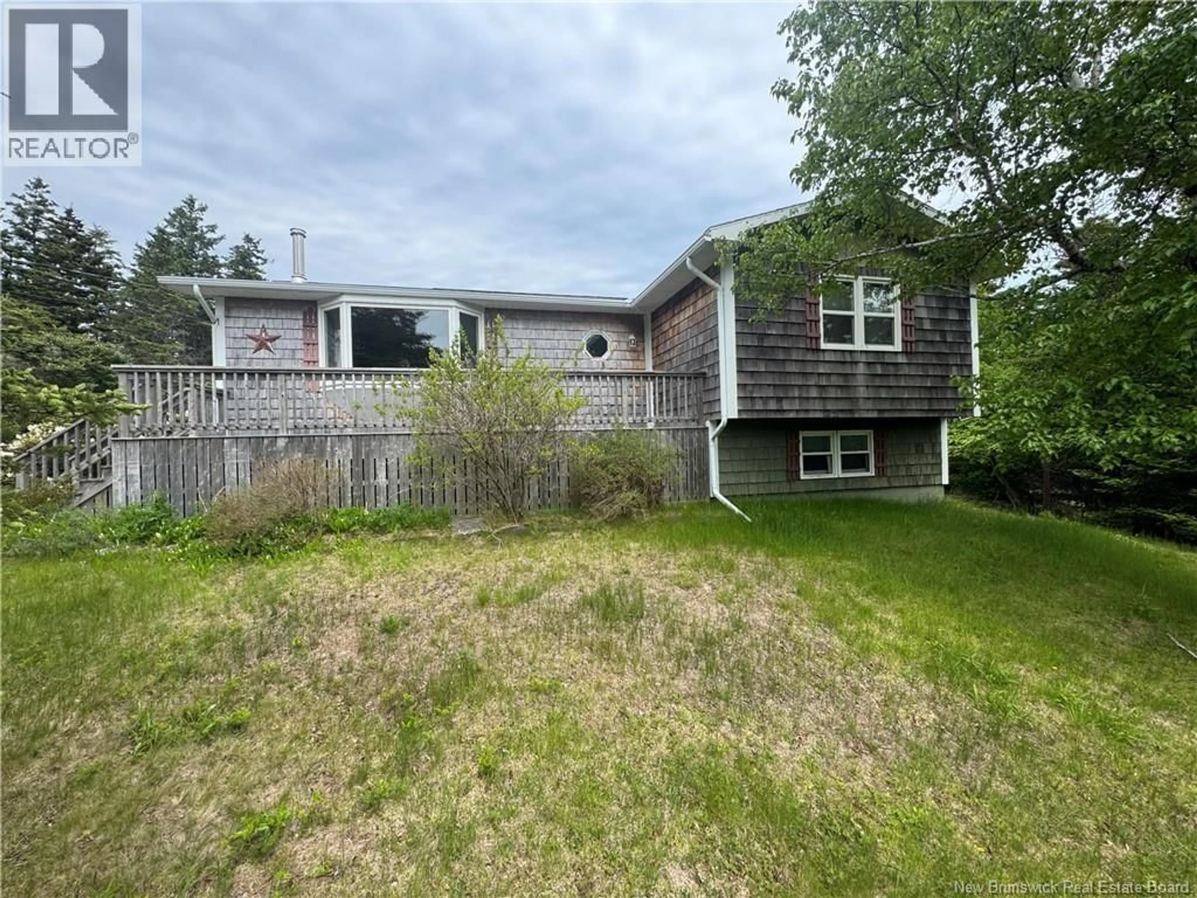 A pic from outside/outdoor area/front of a property/back of a property/a pic from drone, unknown for 208 WHISTLE ROAD, Grand Manan New Brunswick E5G1B5