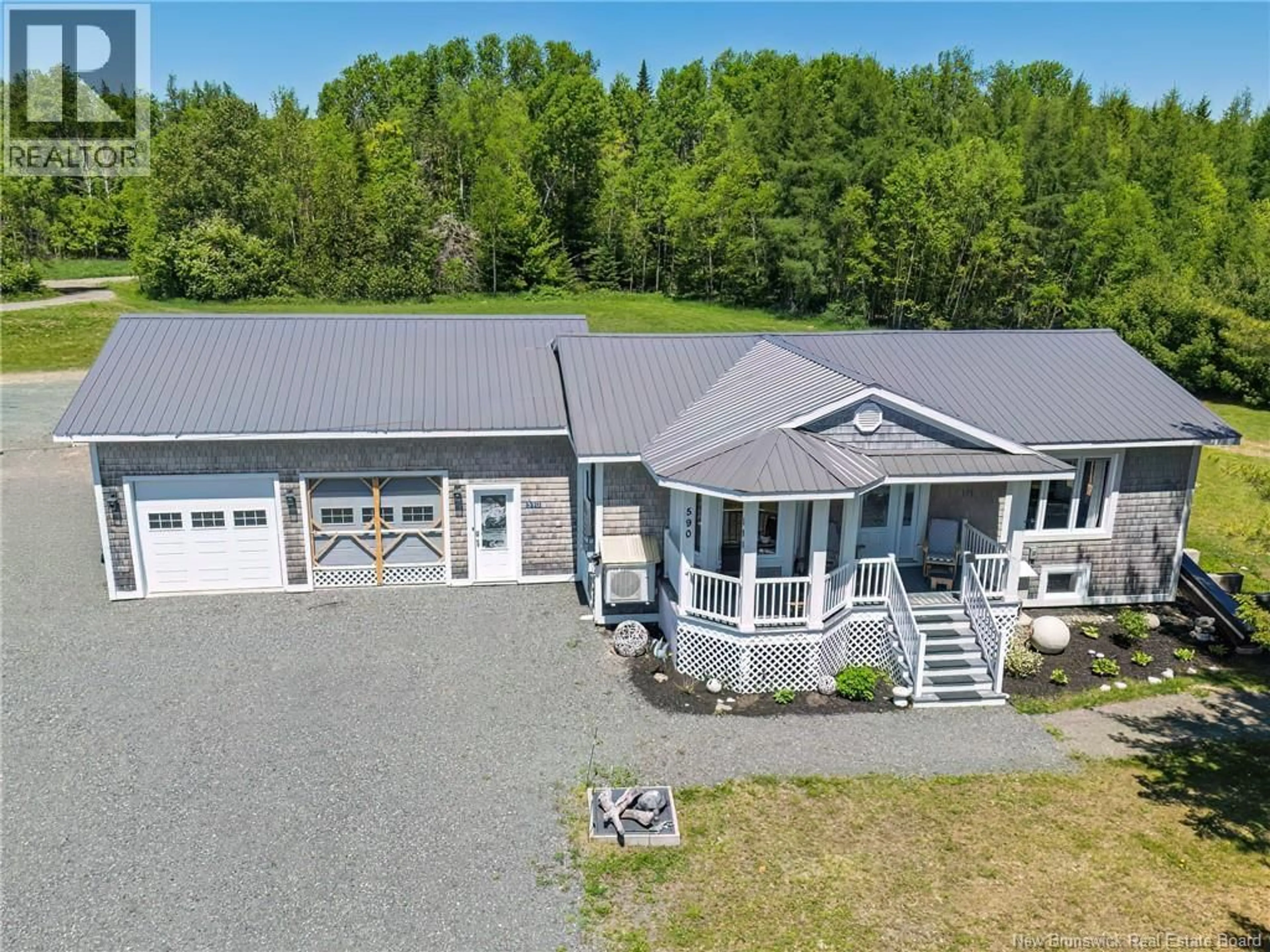 A pic from outside/outdoor area/front of a property/back of a property/a pic from drone, unknown for 590 CANTON, DSL de Drummond/DSL of Drummond New Brunswick E3Y1M2