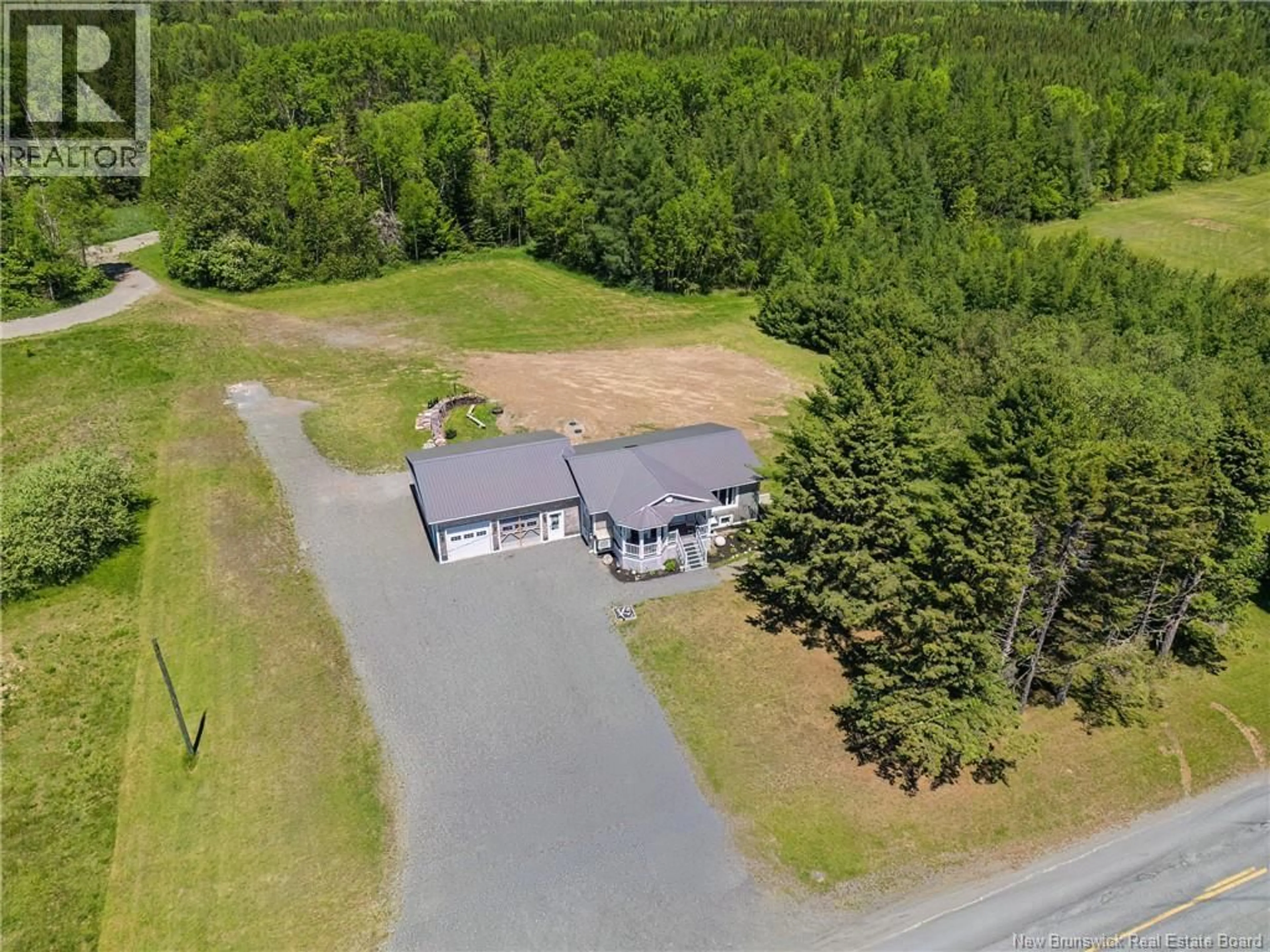 A pic from outside/outdoor area/front of a property/back of a property/a pic from drone, unknown for 590 CANTON, DSL de Drummond/DSL of Drummond New Brunswick E3Y1M2