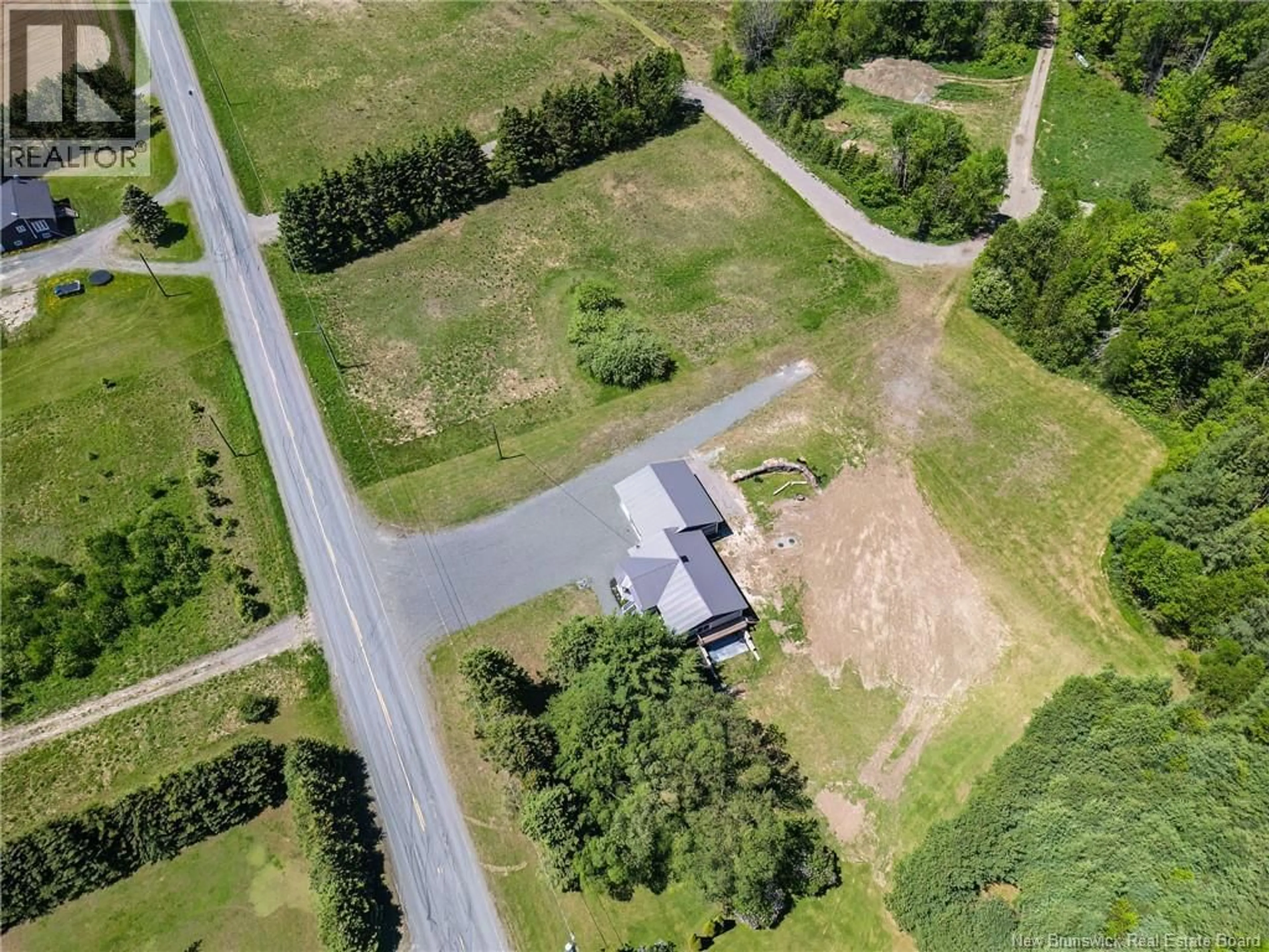 A pic from outside/outdoor area/front of a property/back of a property/a pic from drone, street for 590 CANTON, DSL de Drummond/DSL of Drummond New Brunswick E3Y1M2