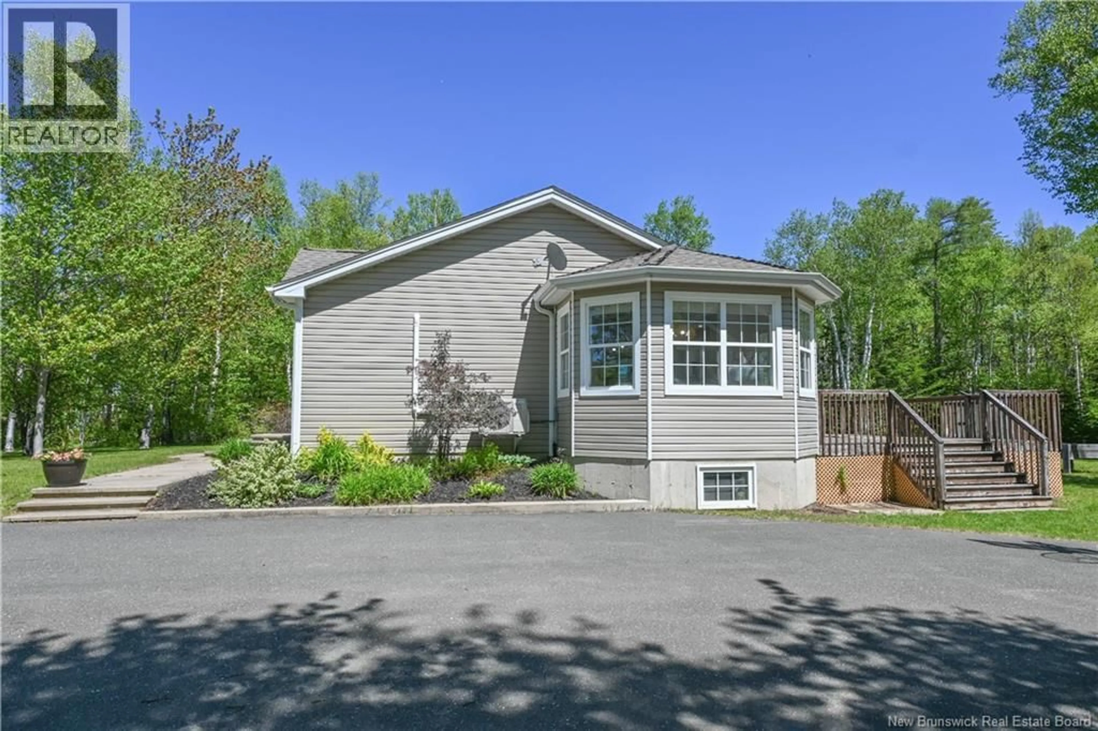 Home with vinyl exterior material, street for 374 DU BICENTENAIRE STREET, Bertrand New Brunswick E1W1G4