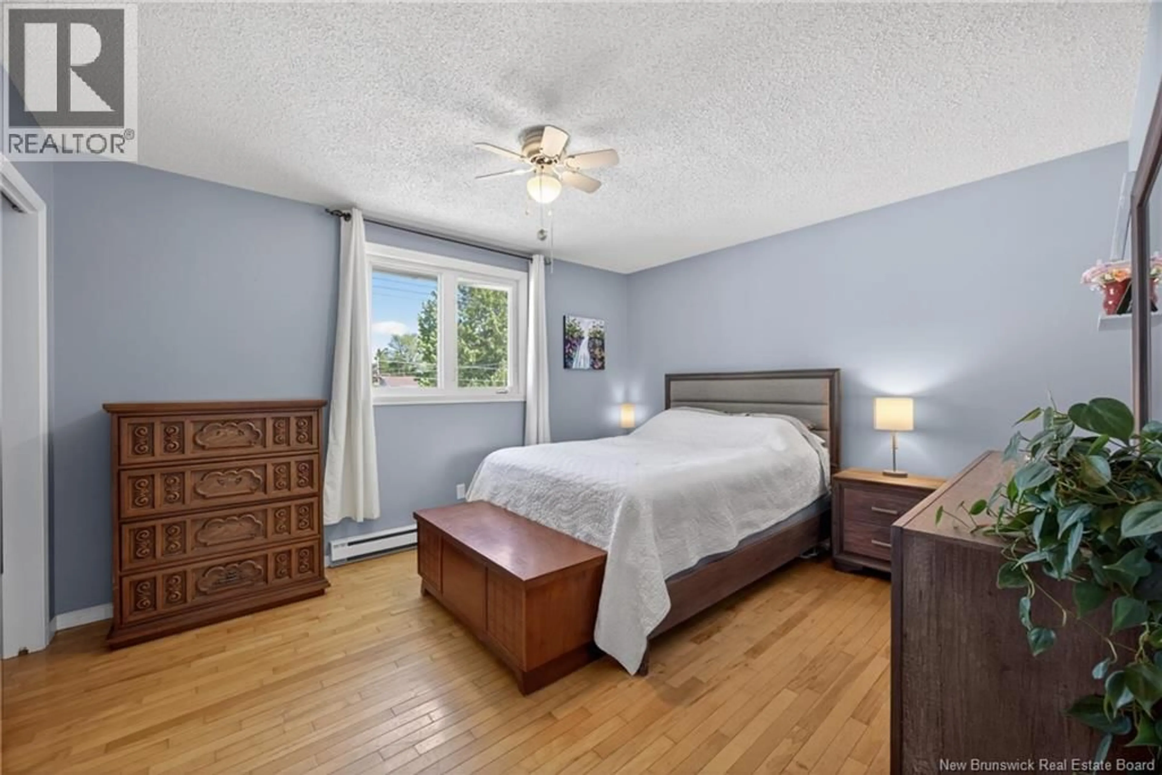 Bedroom with bed, wood/laminate floor for 18 DICKSON STREET, Fredericton New Brunswick E3A5A7