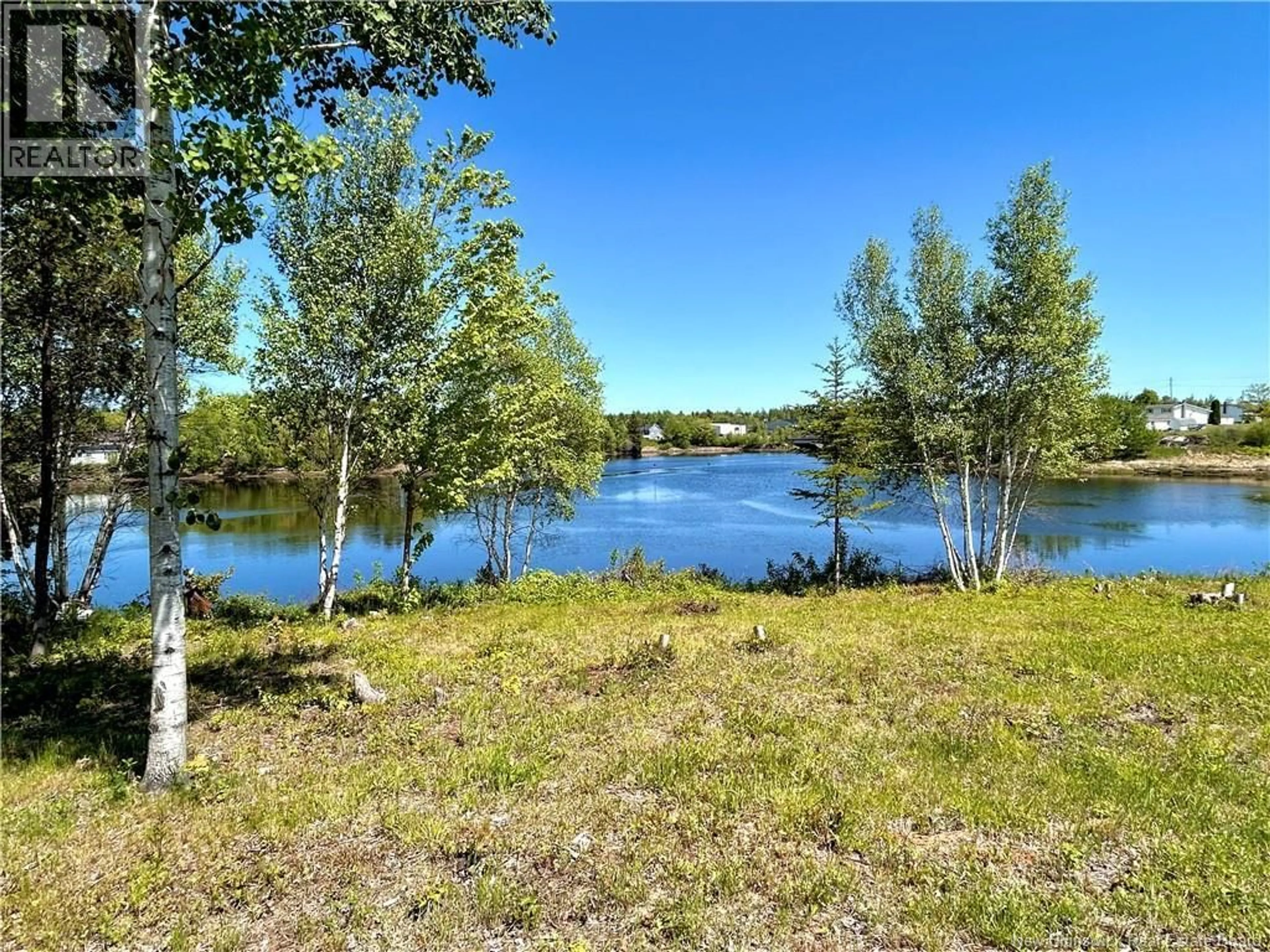 A pic from outside/outdoor area/front of a property/back of a property/a pic from drone, water/lake/river/ocean view for 10 GERALD STREET, Baie-Sainte-Anne New Brunswick E9A1H6