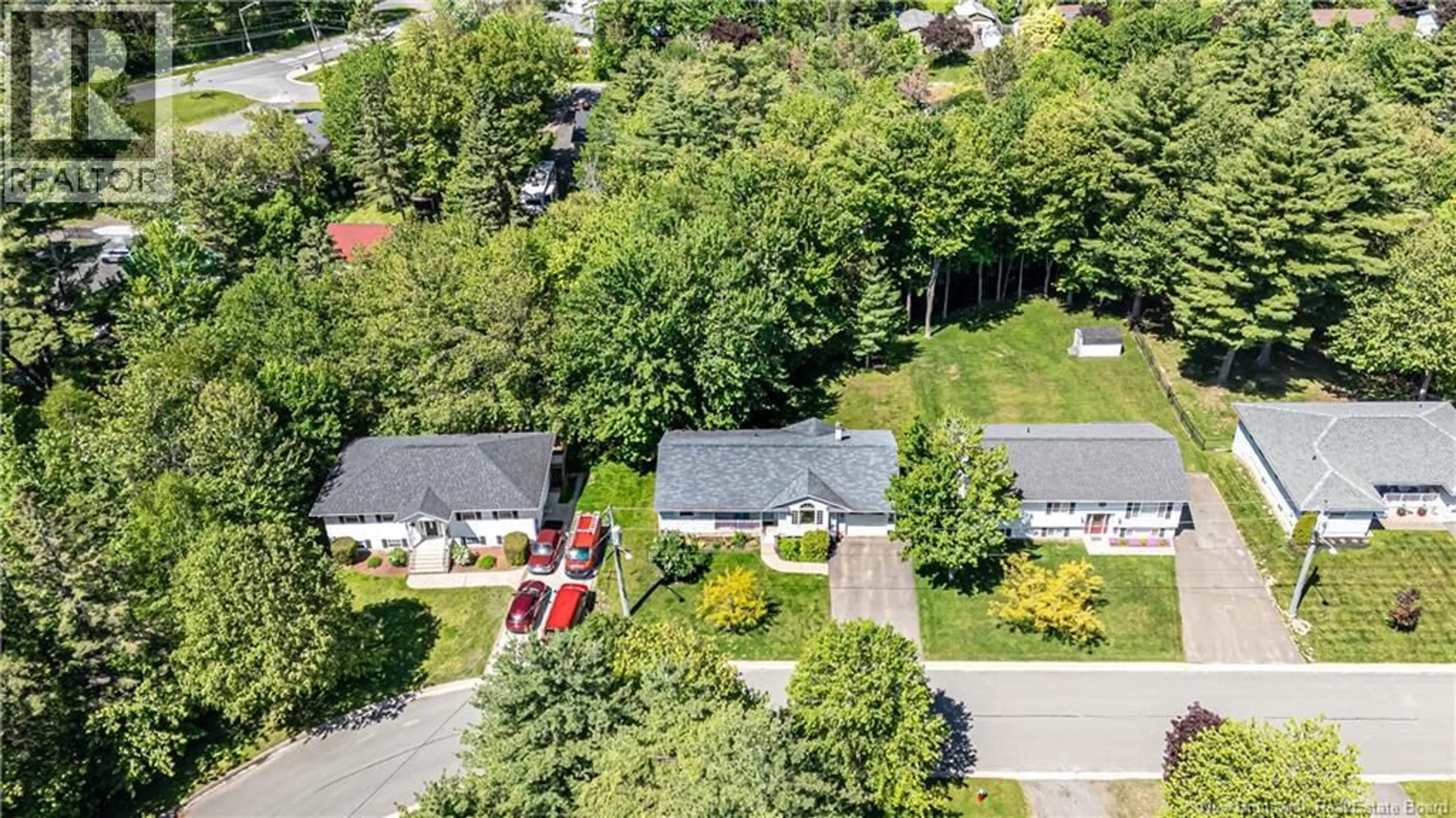A pic from outside/outdoor area/front of a property/back of a property/a pic from drone, street for 22 ROSE COURT, Fredericton New Brunswick E3A5T9