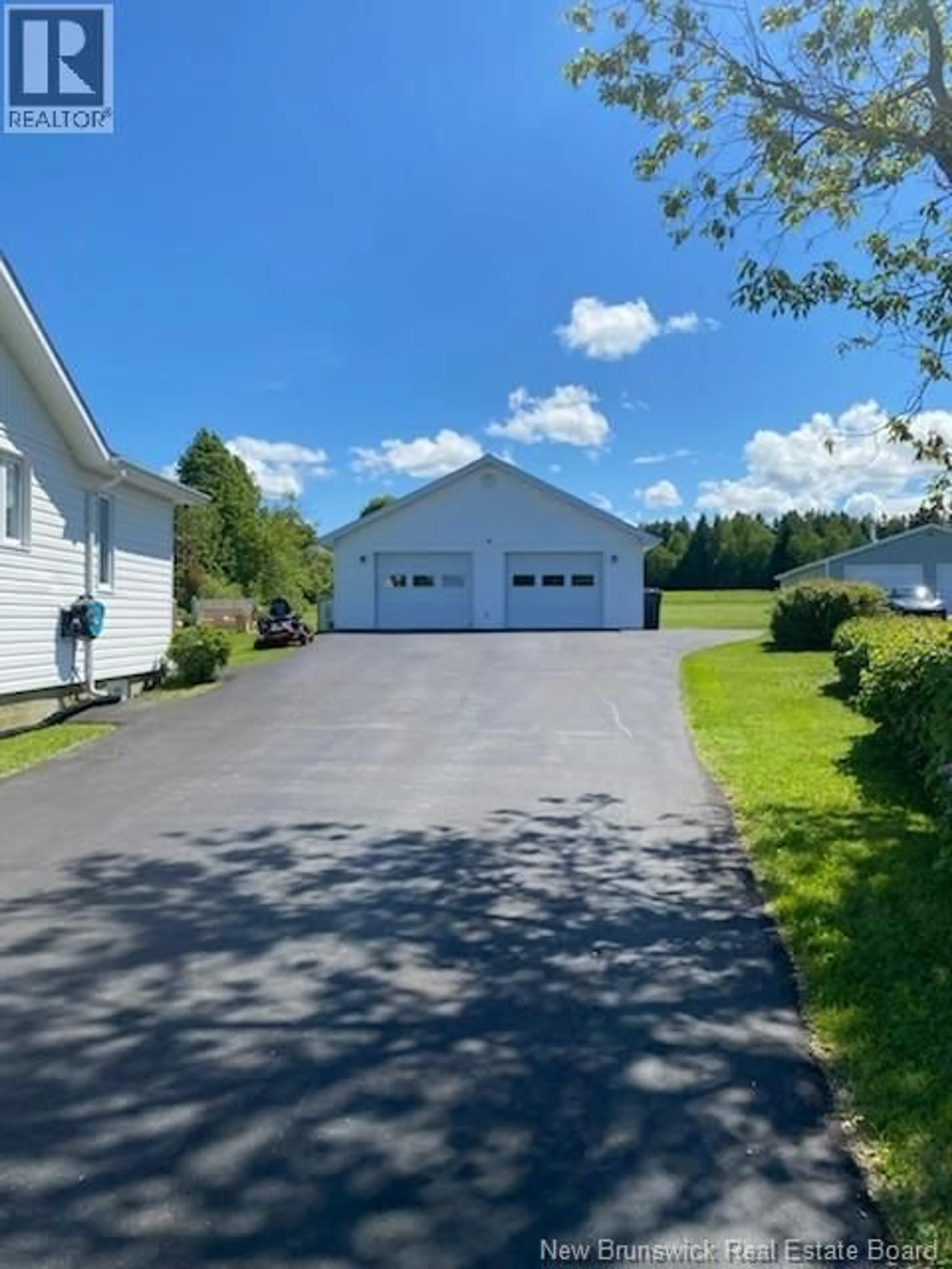 A pic from outside/outdoor area/front of a property/back of a property/a pic from drone, street for 4073 MAIN, Belledune New Brunswick E8G2K7