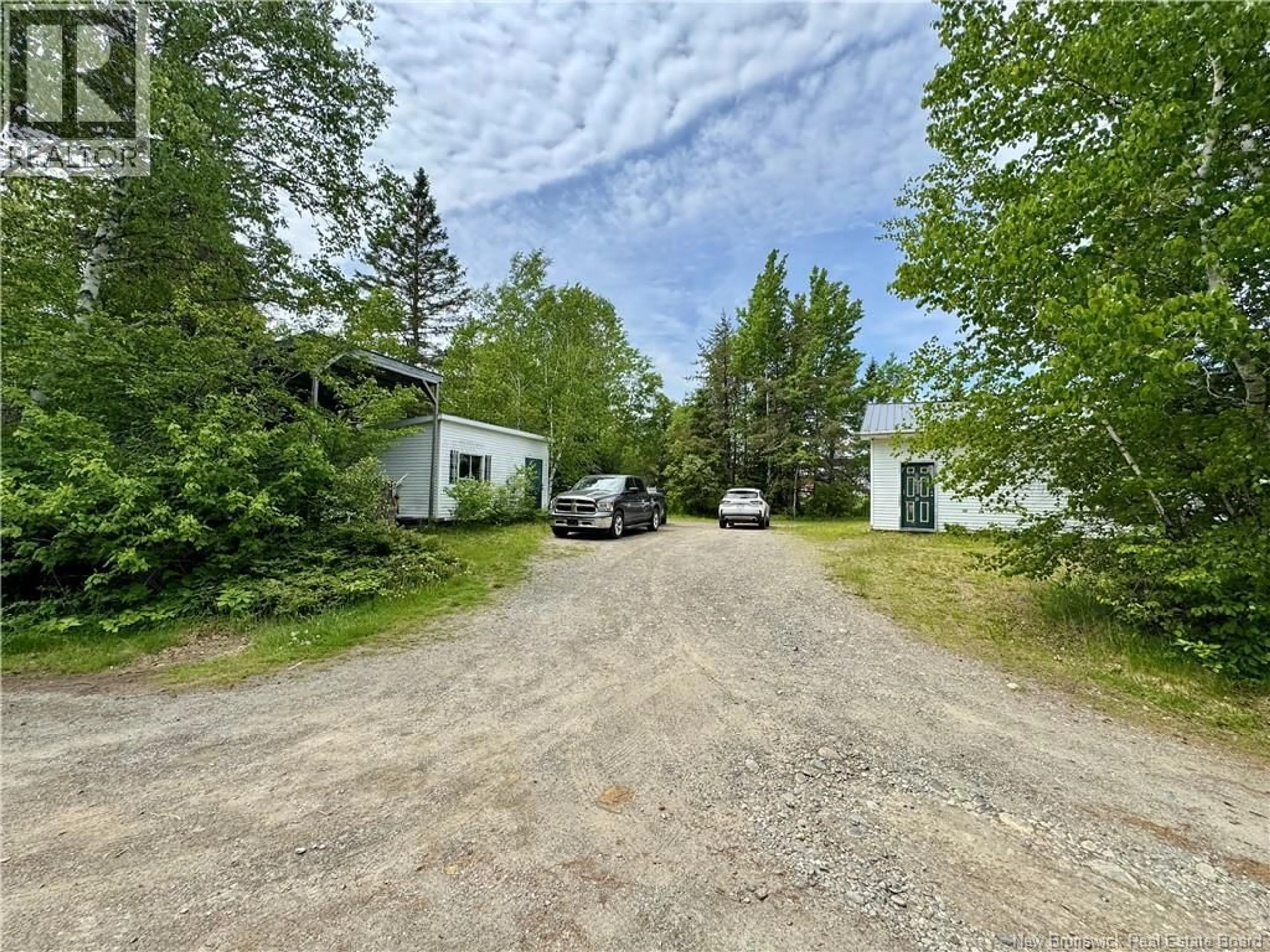 A pic from outside/outdoor area/front of a property/back of a property/a pic from drone, street for 264 ROUTE 170, Oak Bay New Brunswick E3L3X8
