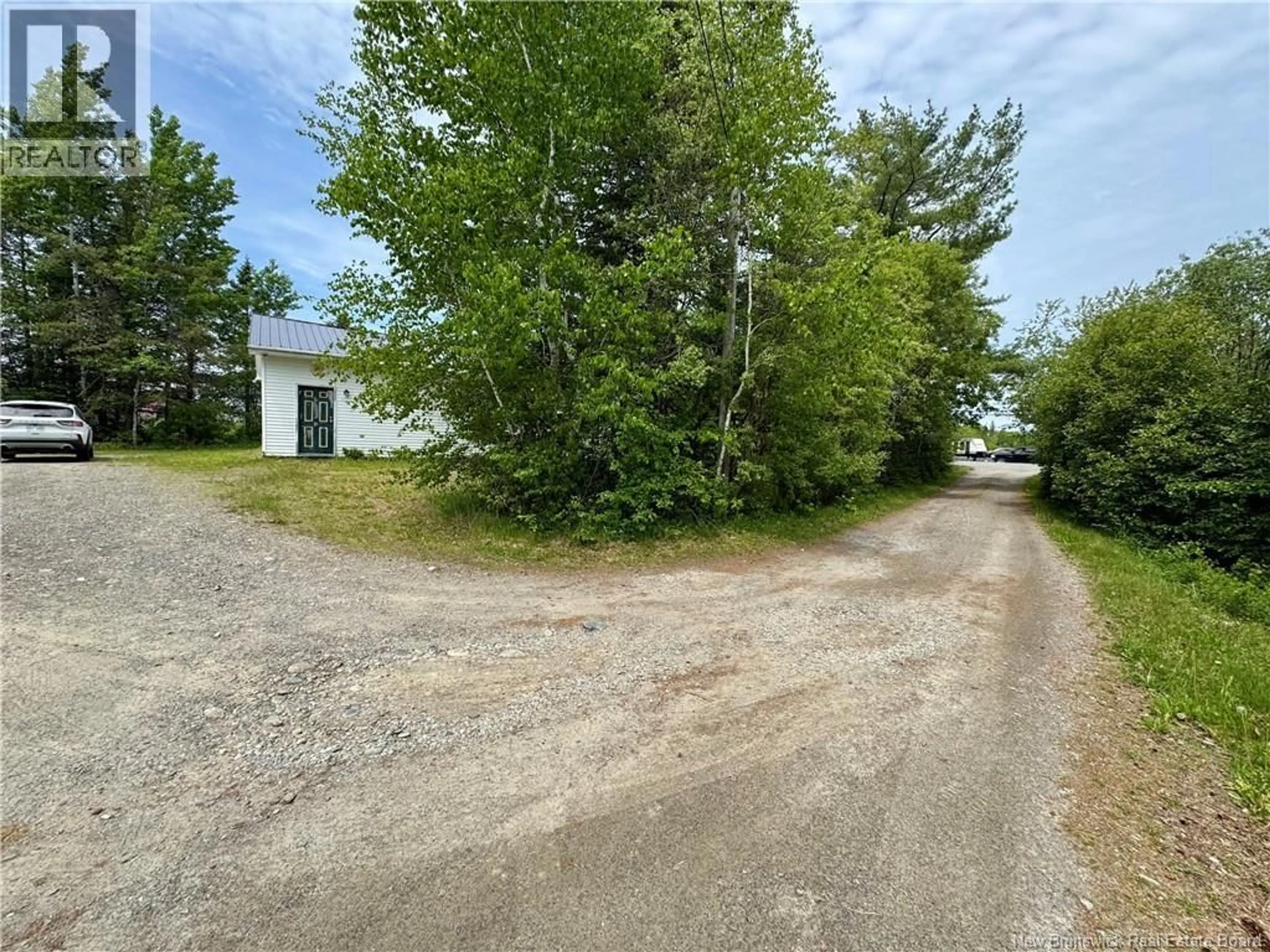 A pic from outside/outdoor area/front of a property/back of a property/a pic from drone, street for 264 ROUTE 170, Oak Bay New Brunswick E3L3X8
