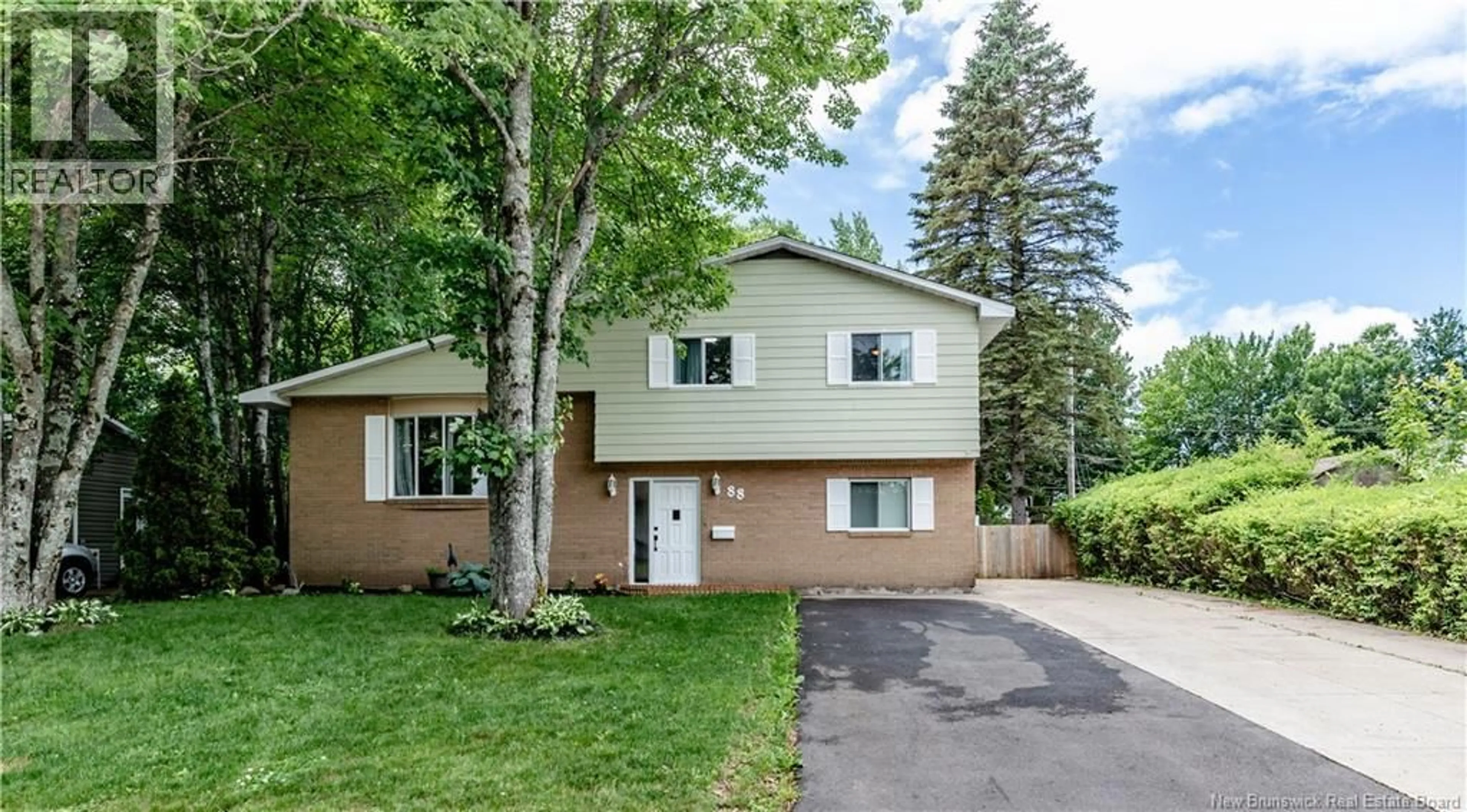Home with vinyl exterior material, street for 88 WOODLEIGH STREET, Moncton New Brunswick E1C8Z8