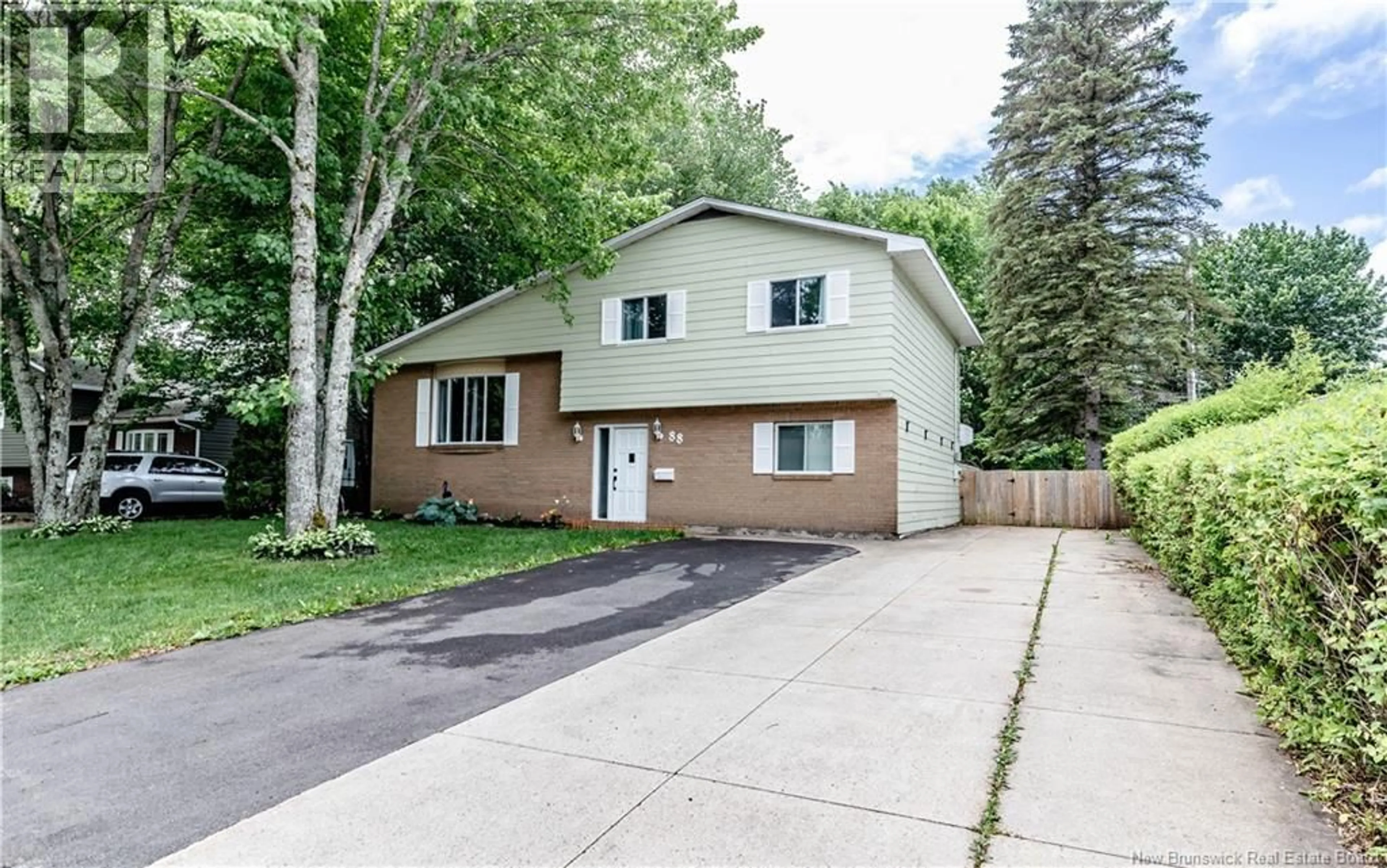 Home with vinyl exterior material, street for 88 WOODLEIGH STREET, Moncton New Brunswick E1C8Z8
