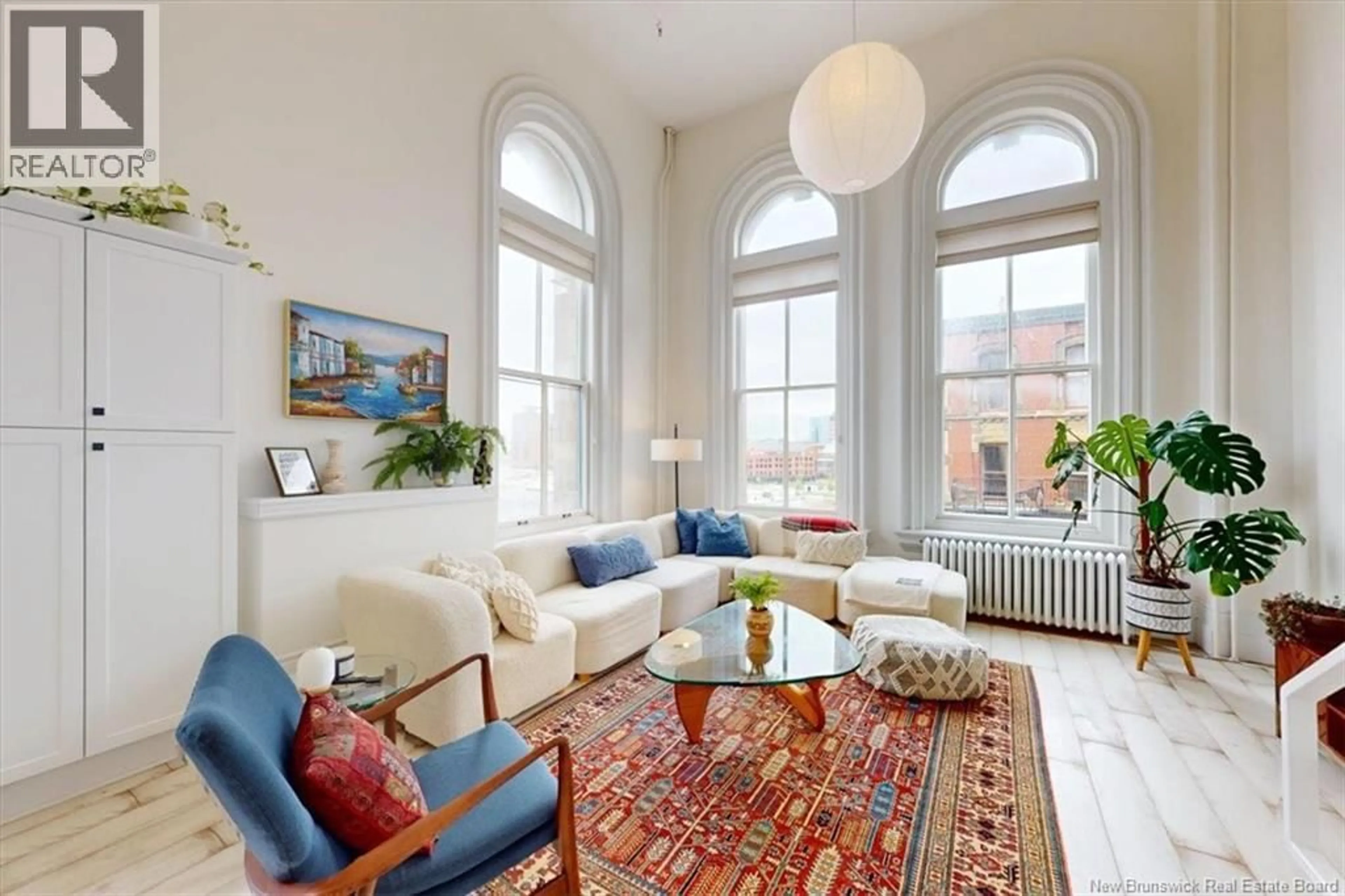 Living room with furniture, unknown for 203 - 115 PRINCE WILLIAM STREET, Saint John New Brunswick E2L2B4