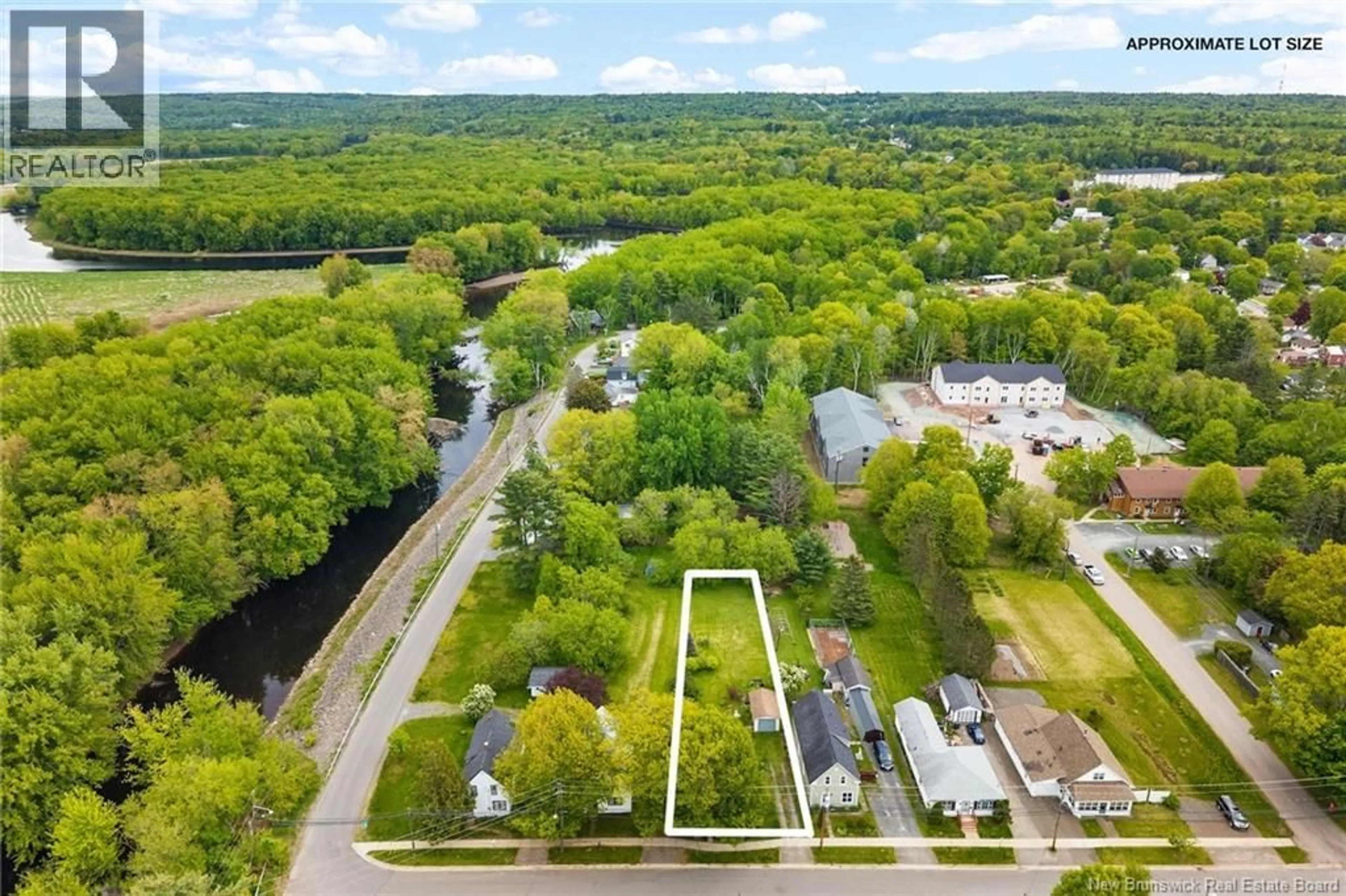 A pic from outside/outdoor area/front of a property/back of a property/a pic from drone, water/lake/river/ocean view for 19 CHARLES AVENUE, Fredericton New Brunswick E3A3S3