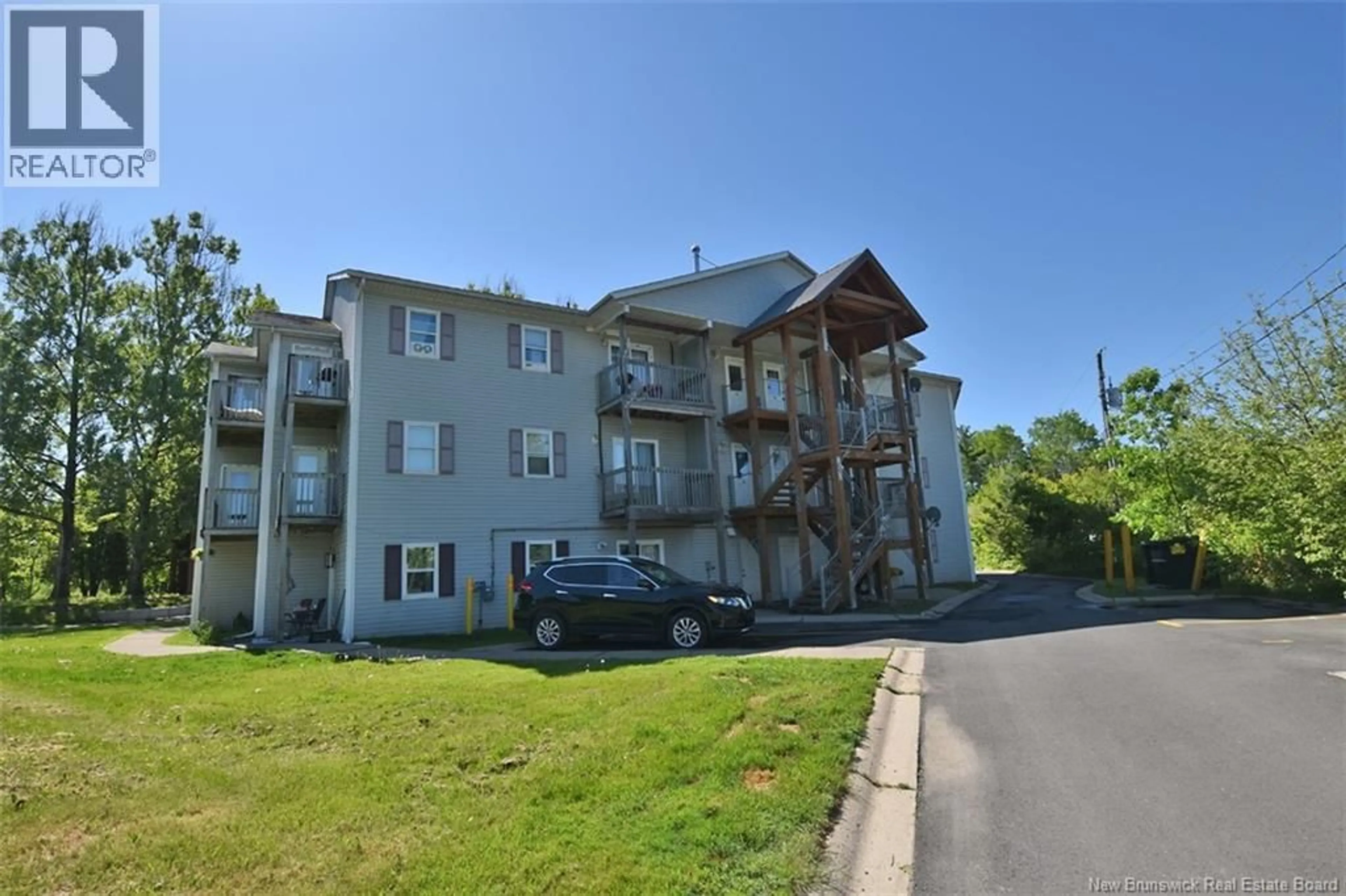 A pic from outside/outdoor area/front of a property/back of a property/a pic from drone, building for 209 - 60 GOODINE STREET, Fredericton New Brunswick E3B9N5
