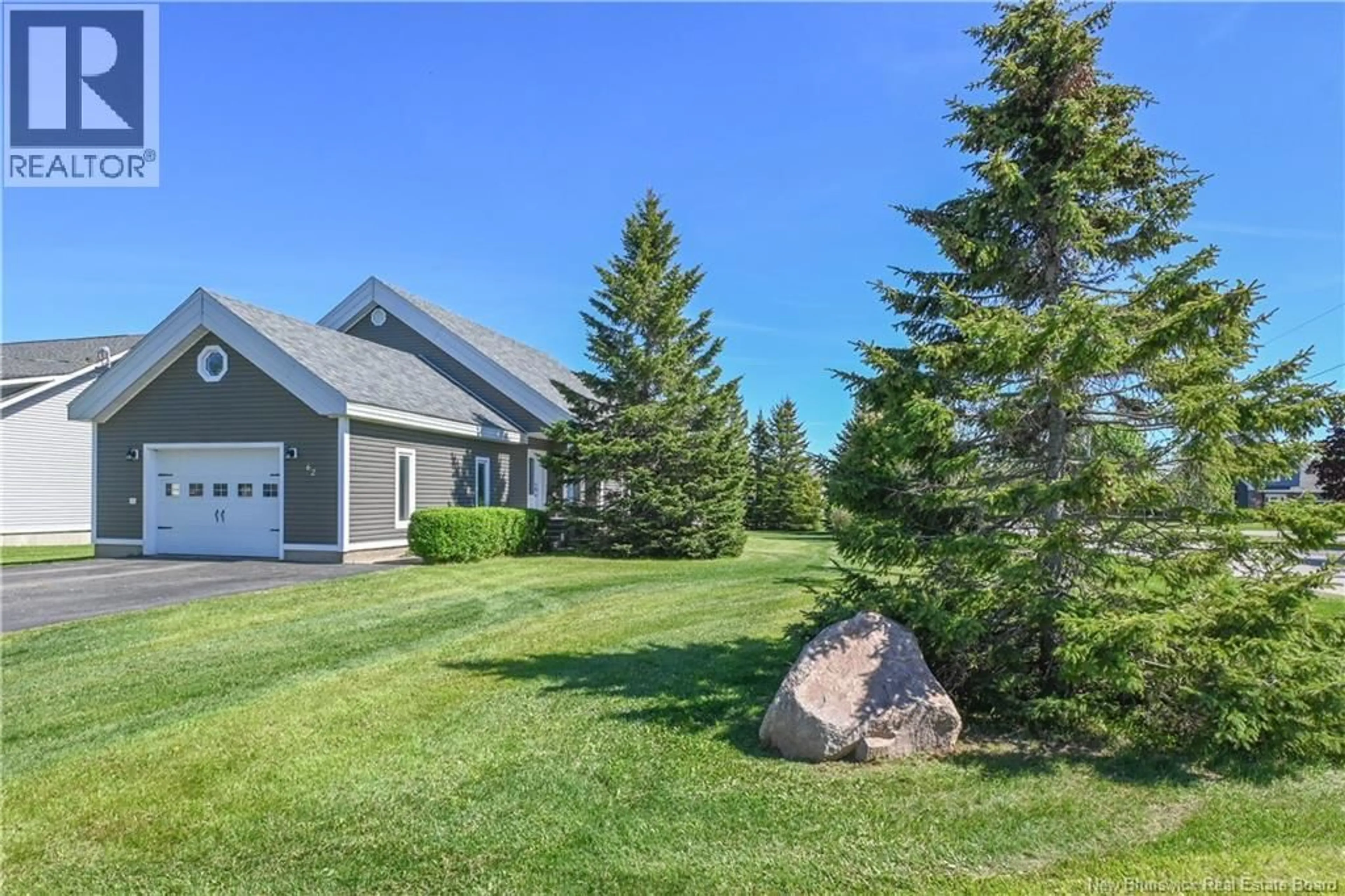 A pic from outside/outdoor area/front of a property/back of a property/a pic from drone, mountain view for 62 PARISÉ STREET, Caraquet New Brunswick E1W1B6