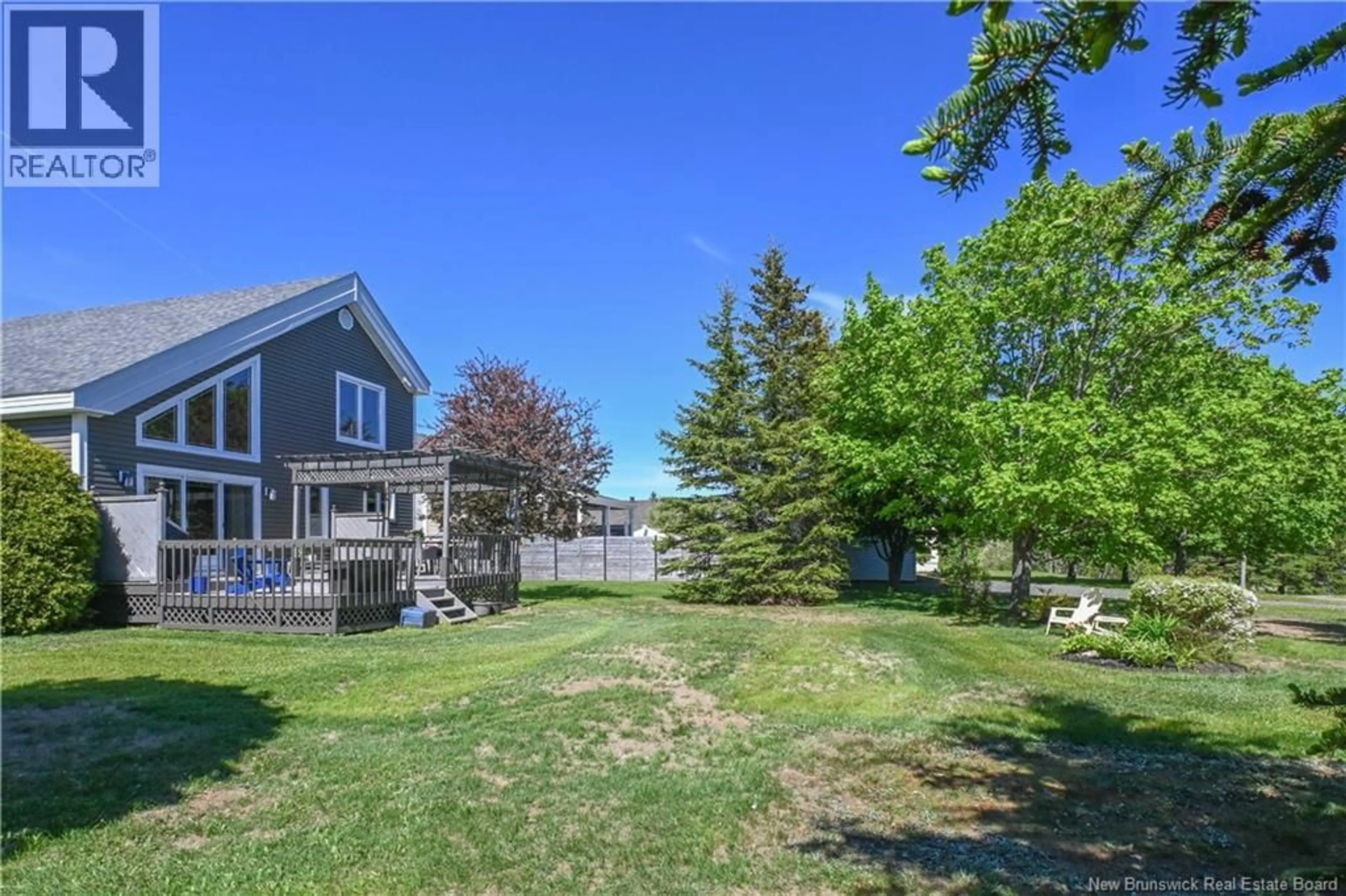 A pic from outside/outdoor area/front of a property/back of a property/a pic from drone, water/lake/river/ocean view for 62 PARISÉ STREET, Caraquet New Brunswick E1W1B6